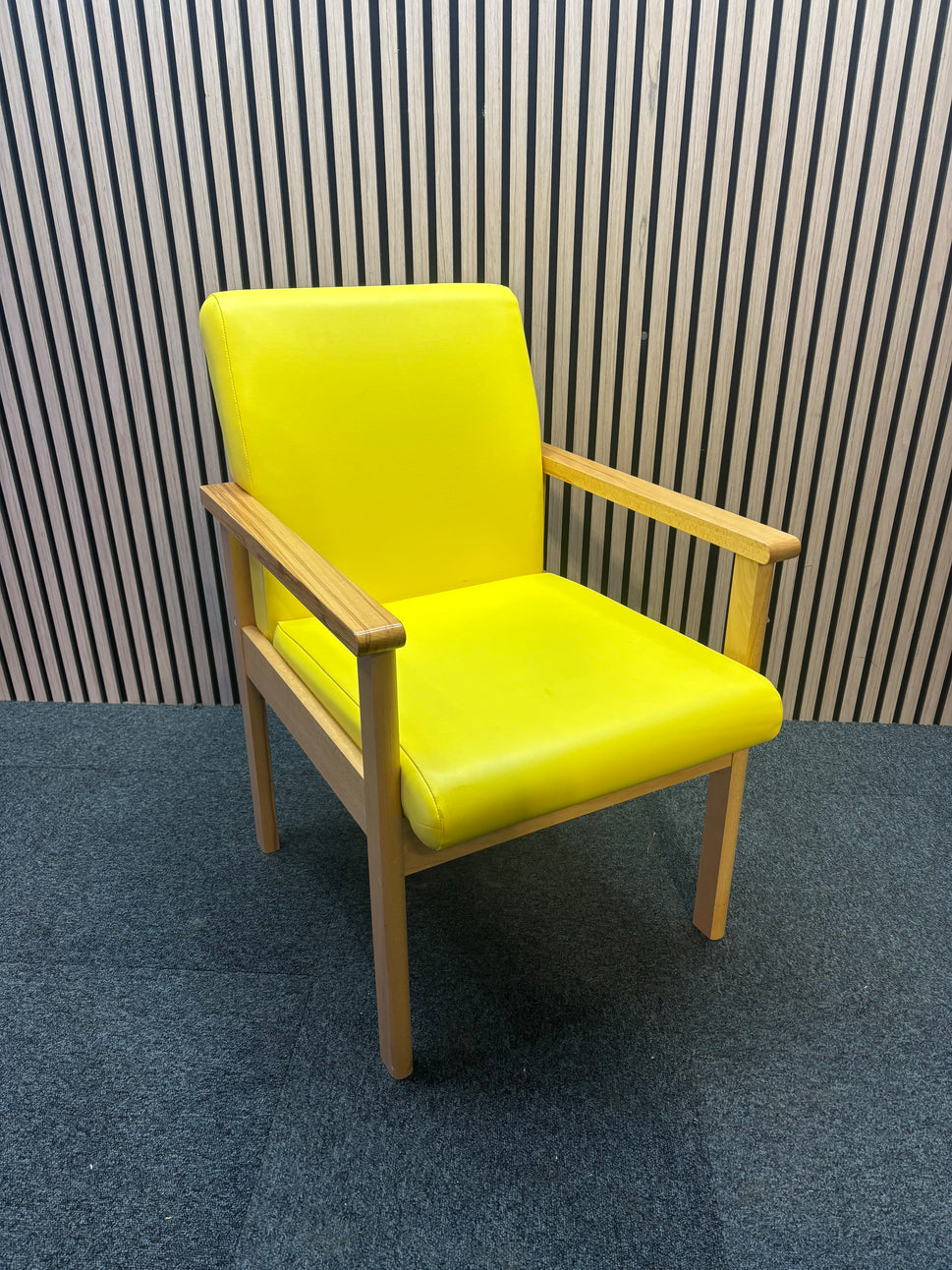 Yellow Meavy reception chair with leatherette seats