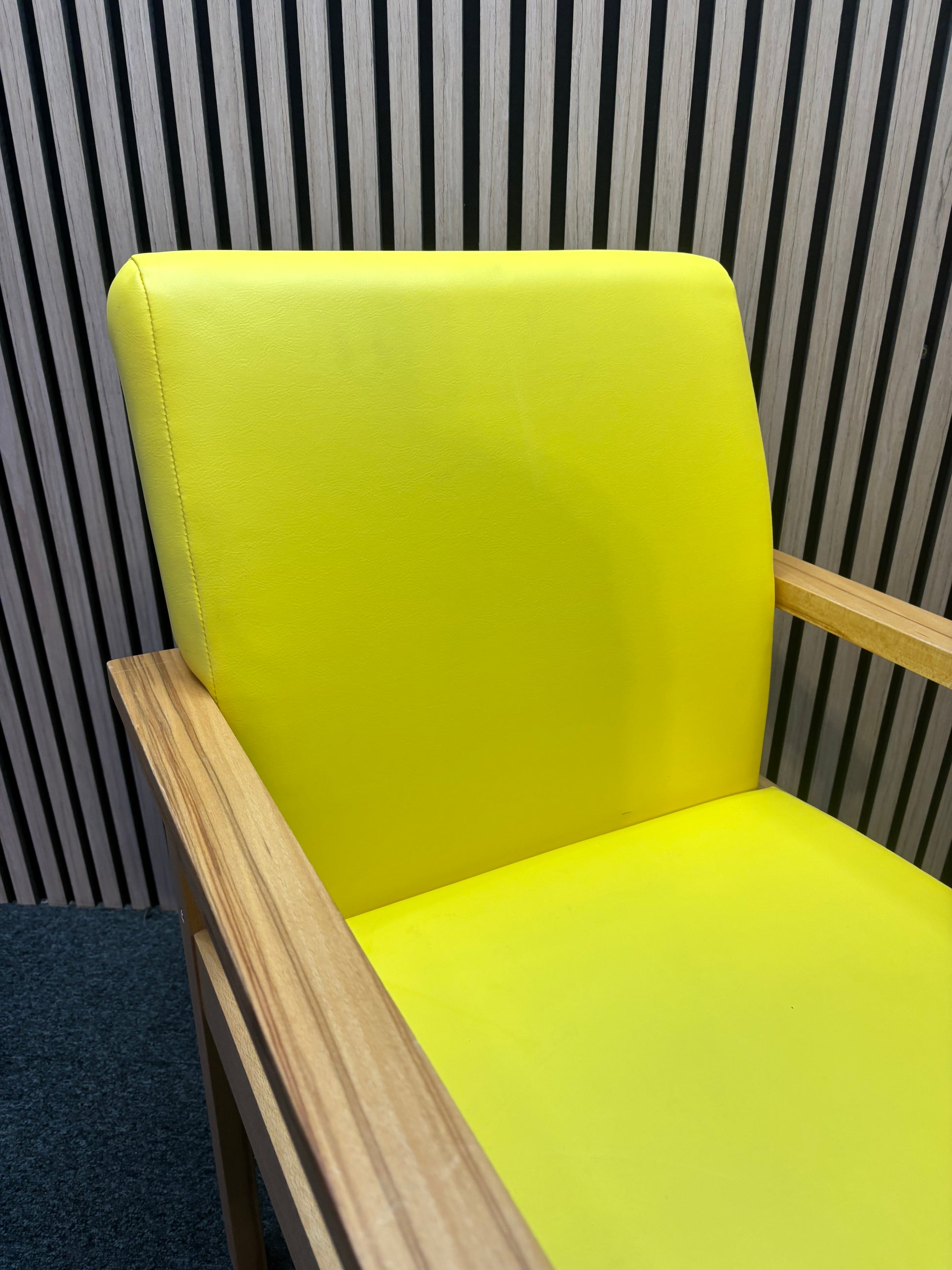 Yellow Meavy reception chair with leatherette seats