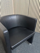 Switch Dark leather curved back tub chair 2 image