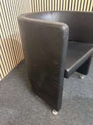 Switch Dark leather curved back tub chair 3 image