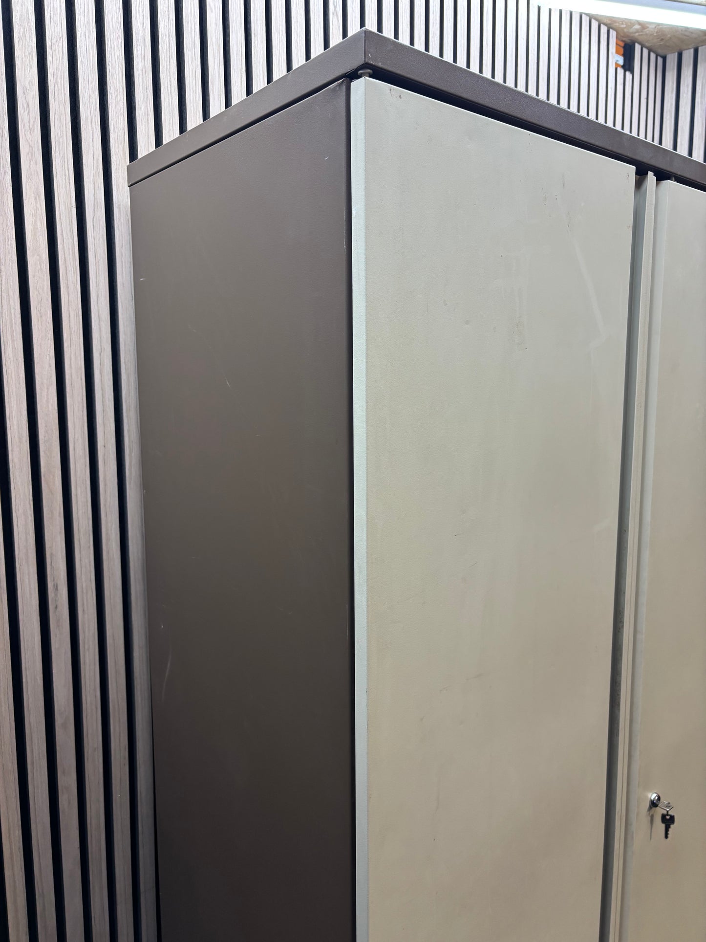 Tall 2 door coffee cream tall steel unit with internal shelves and key 95Wx49Dx184H