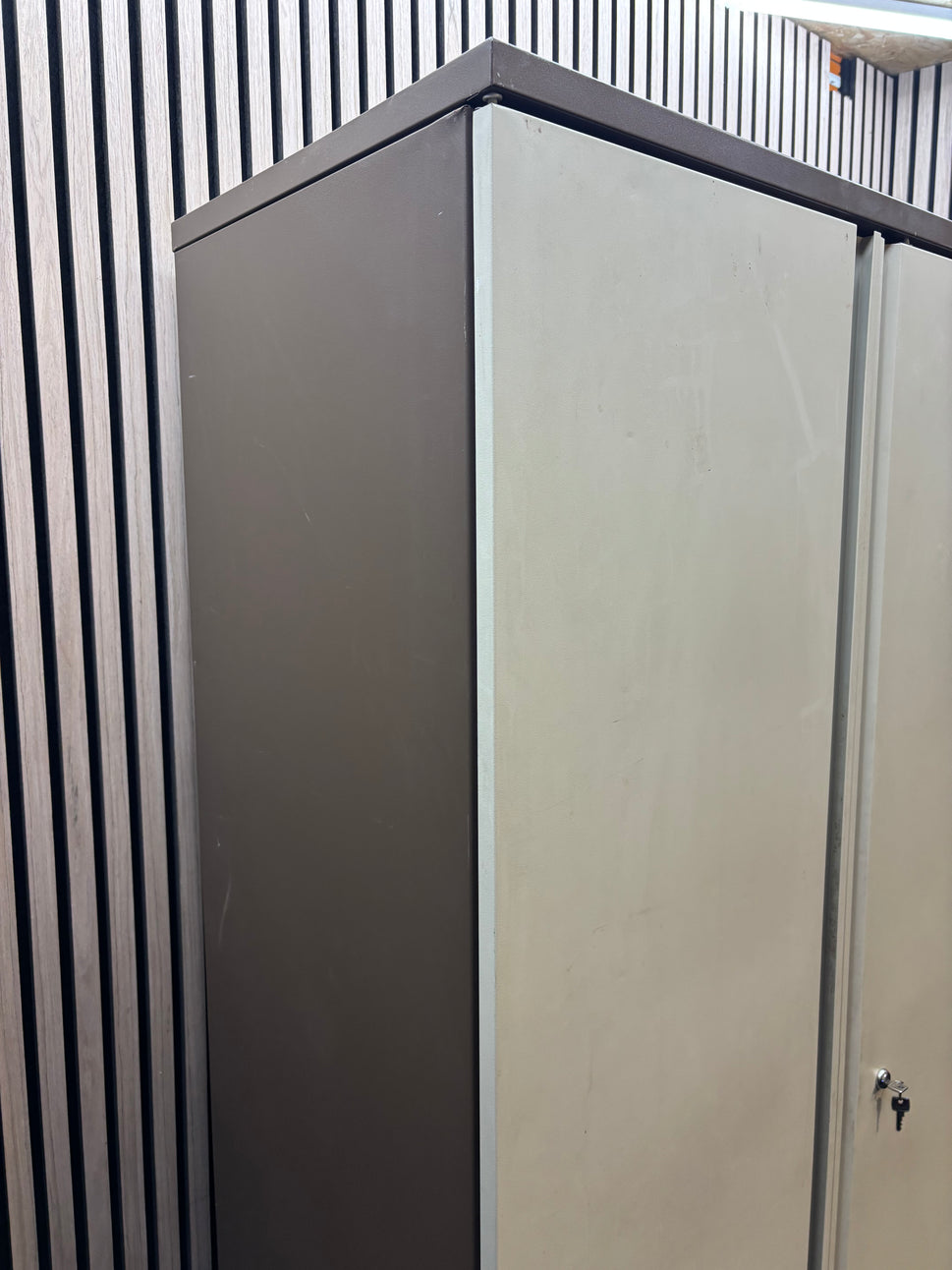 Tall 2 door coffee cream tall steel unit with internal shelves and key 95Wx49Dx184H