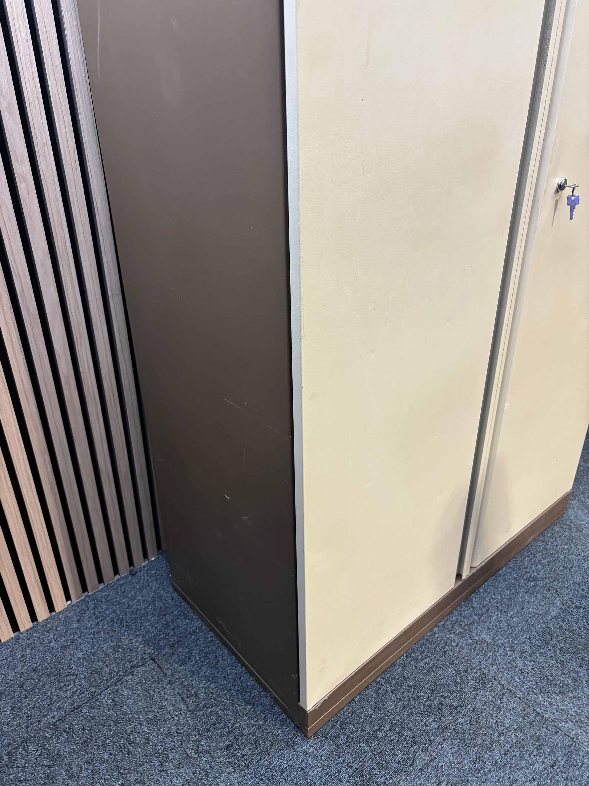Tall 2 door coffee cream tall steel unit with internal shelves and key 95Wx49Dx184H