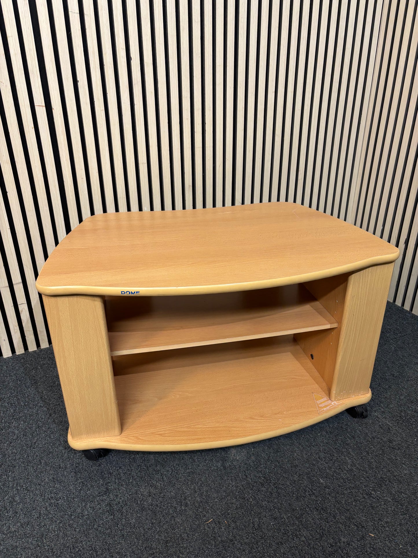 Beech laminate low TV unit on castors 3126
