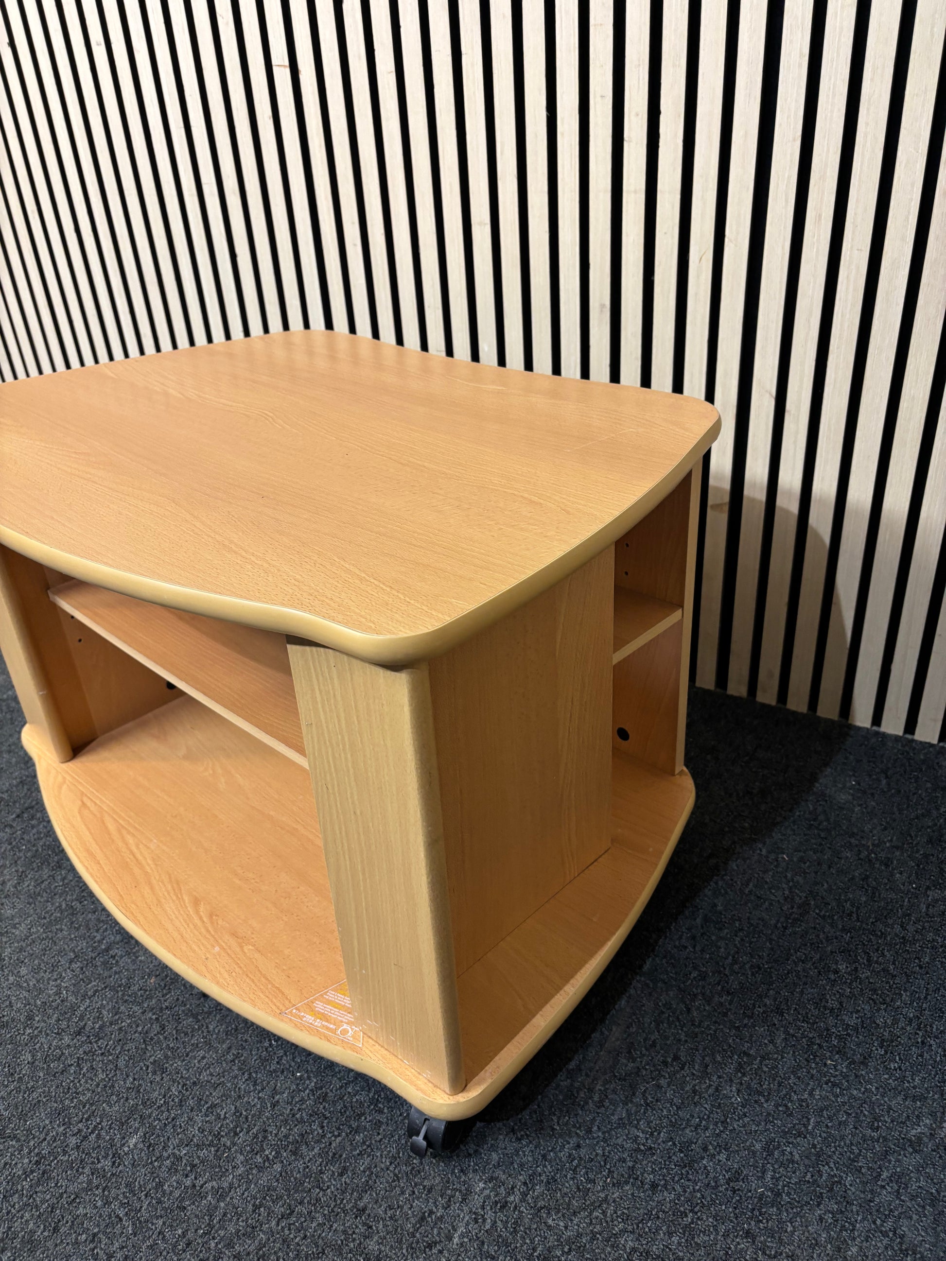 Beech laminate low TV unit on castors 3126