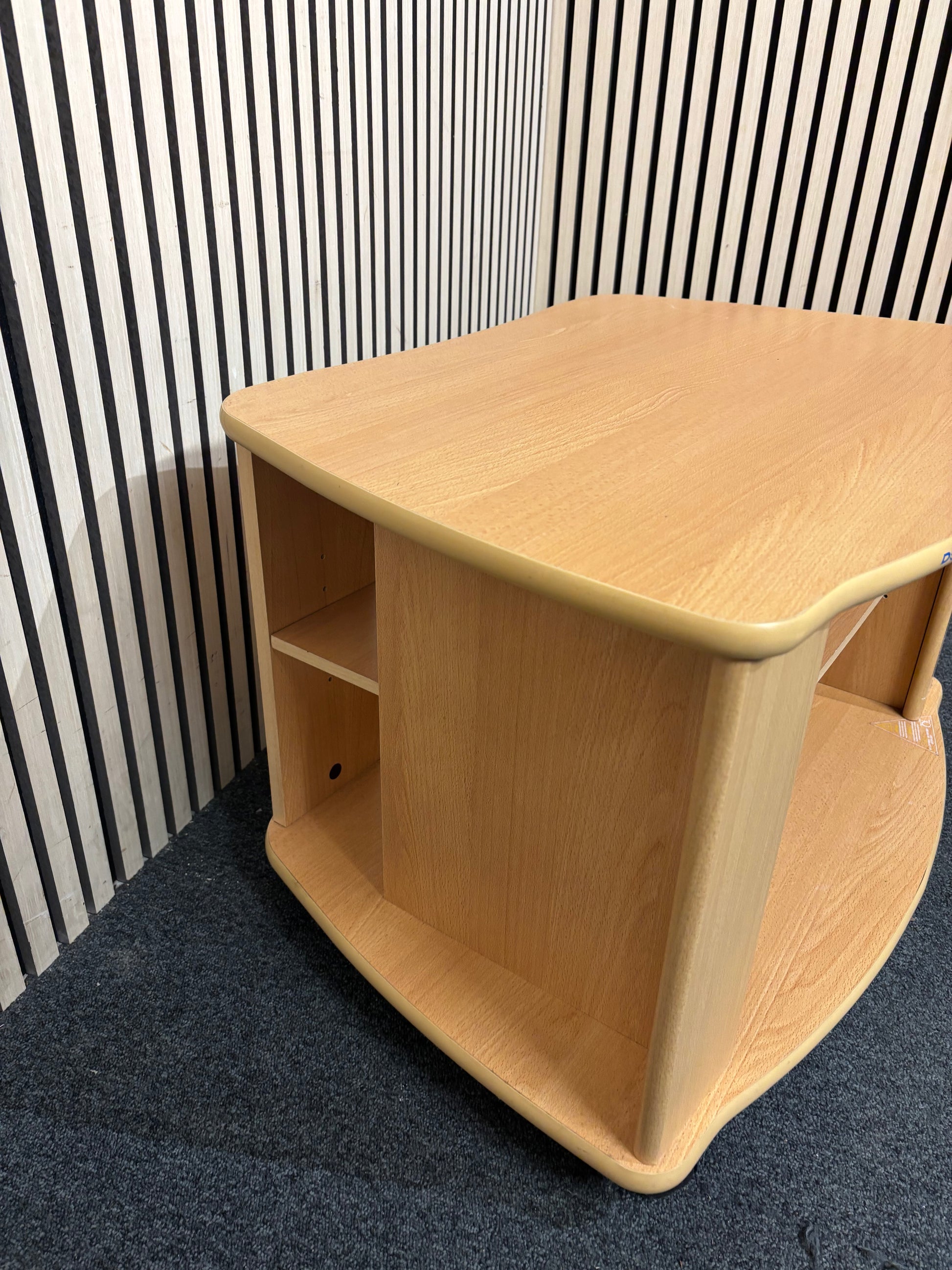 Beech laminate low TV unit on castors 3126