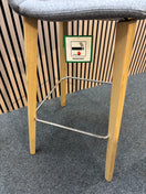 Remy fully upholstered high stool with solid wooden frame and soft grey fabric