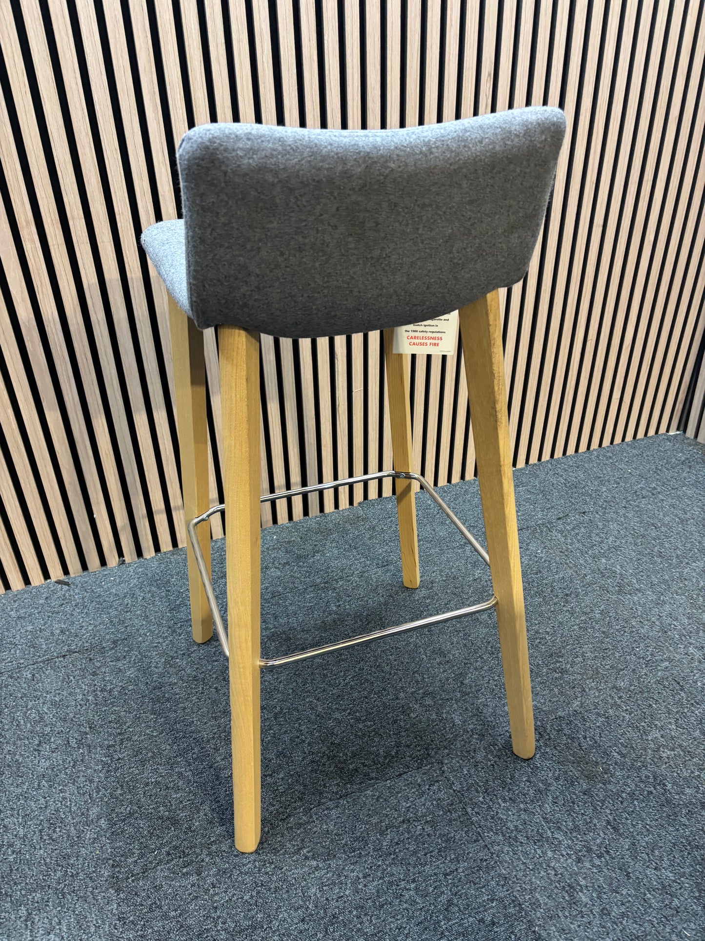 Remy fully upholstered high stool with solid wooden frame and soft grey fabric