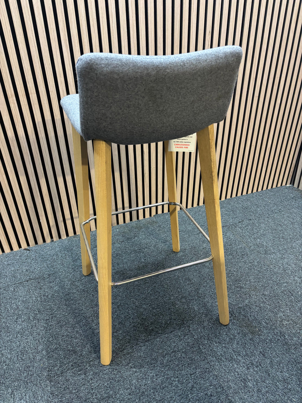 Remy fully upholstered high stool with solid wooden frame and soft grey fabric