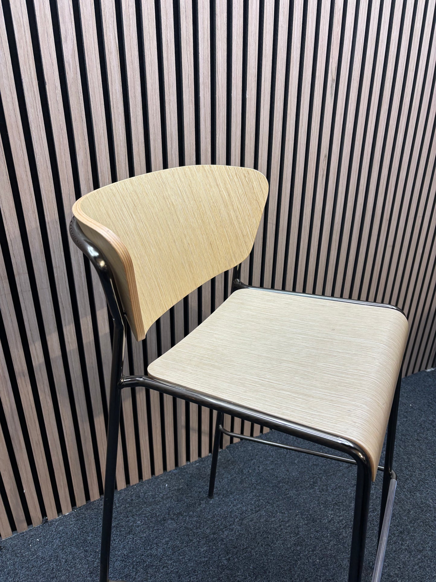 Salo bar stool with natural oak and solid 4 legged black frame