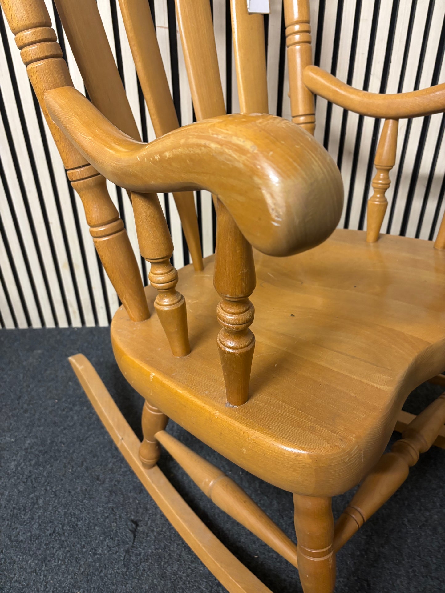 High back solid wood rocking chair with ornate details  2226