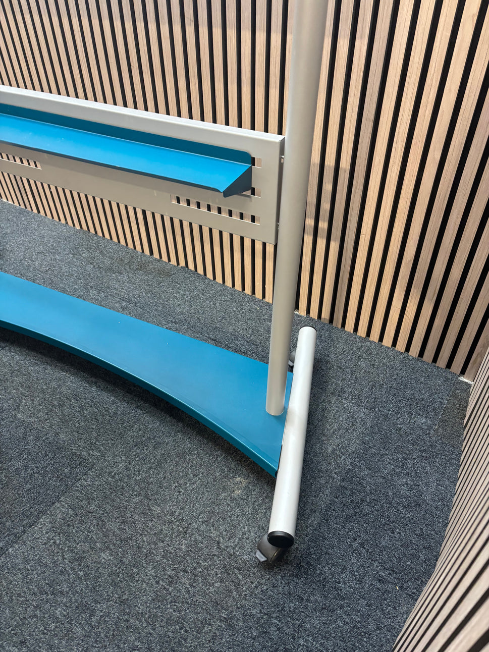 Large mobile whiteboard on castors