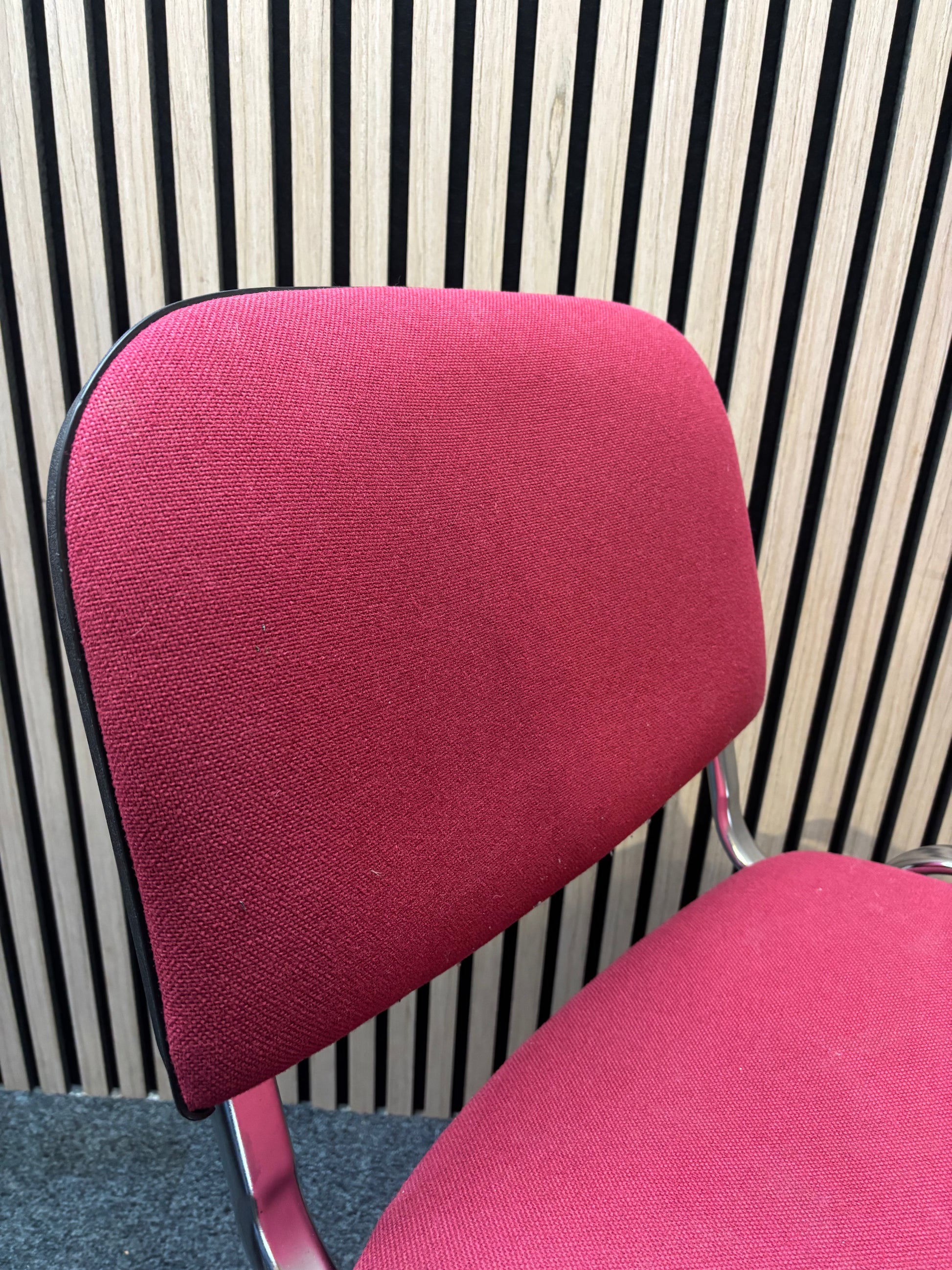 Red fabric solid metal framed stacking chair