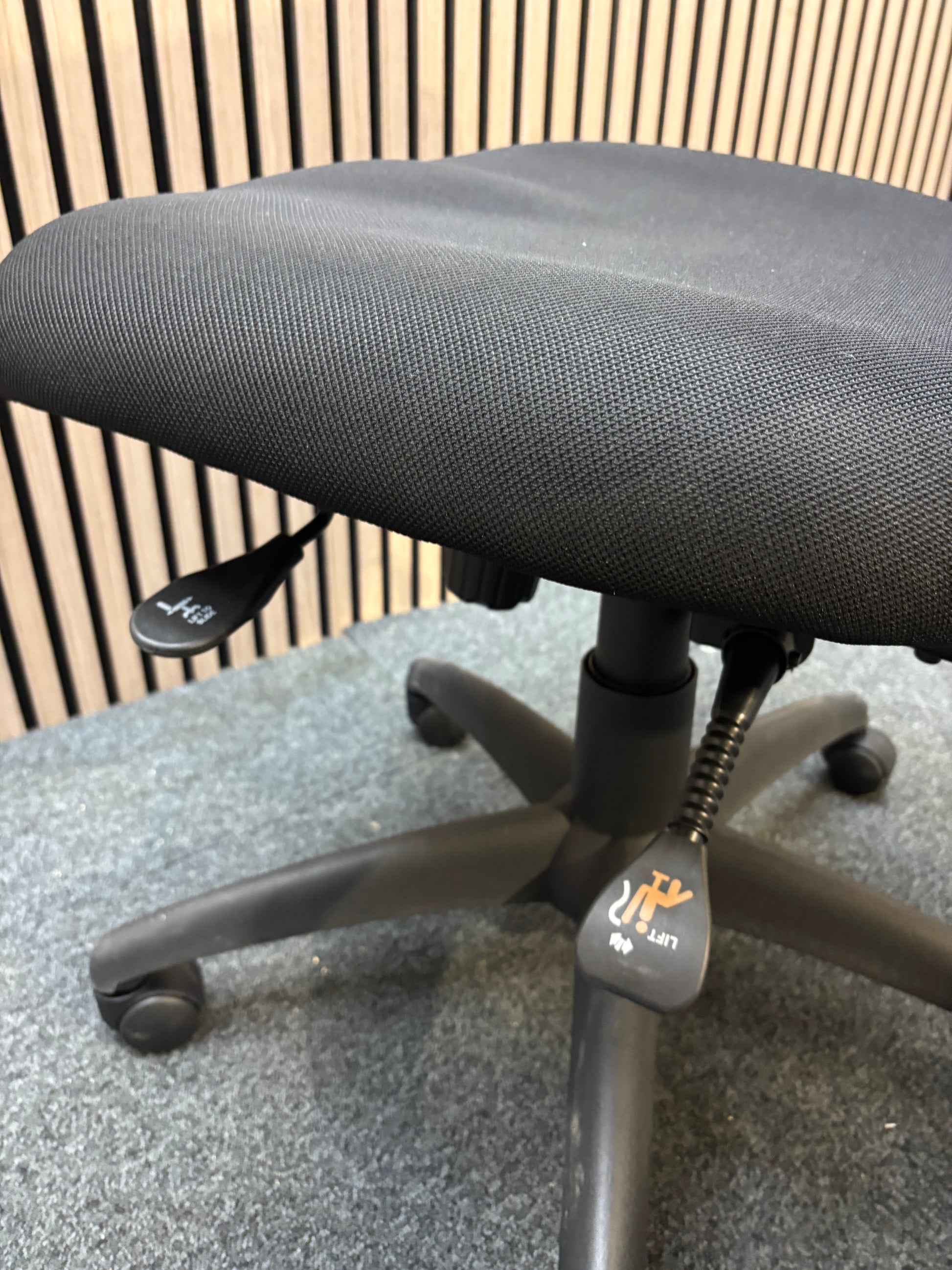 NEW Napier black fabric height adjustable swivel chair with black fabric pivot arms. PRICE INC VAT