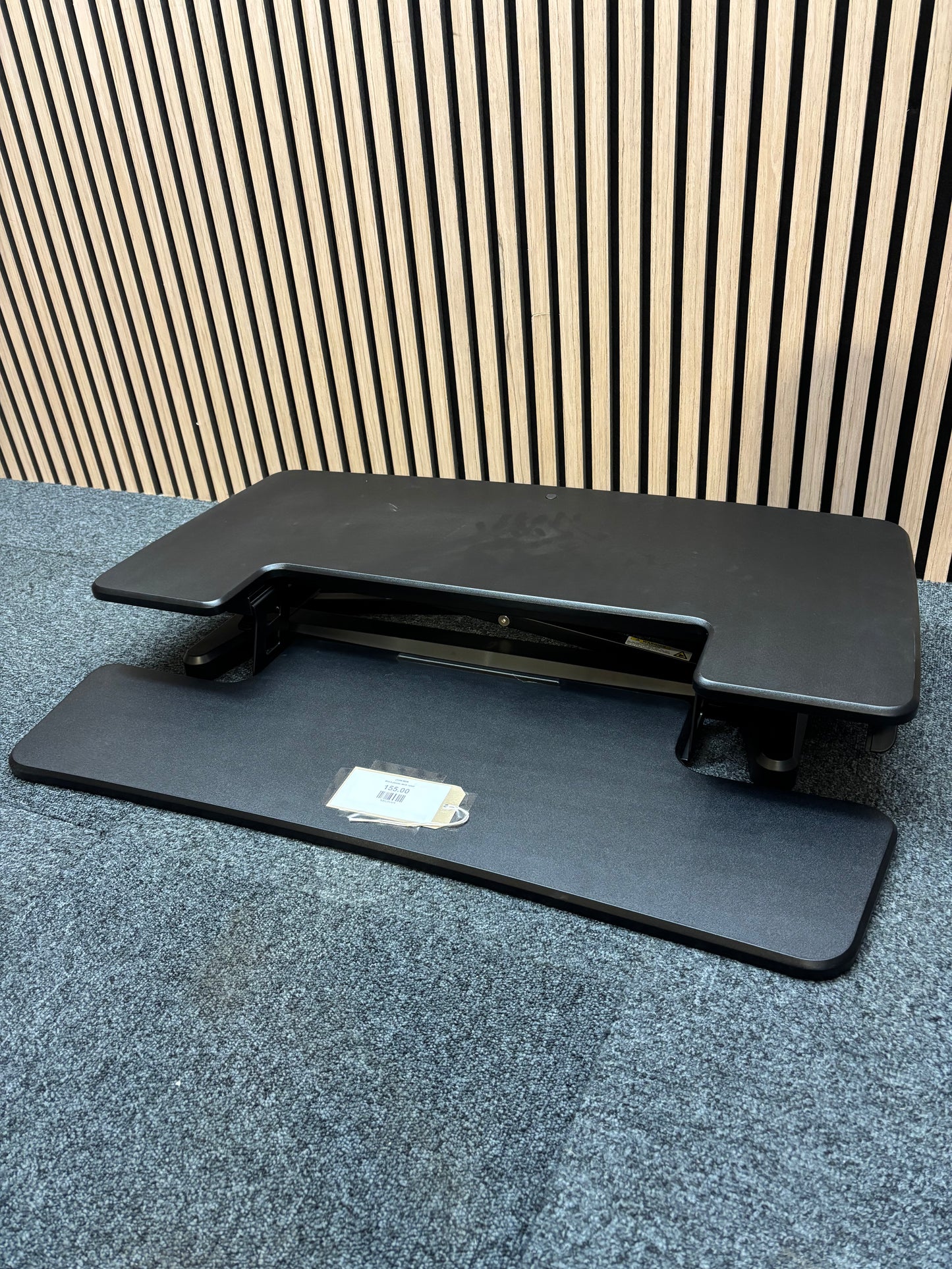 Black plastic desk raiser