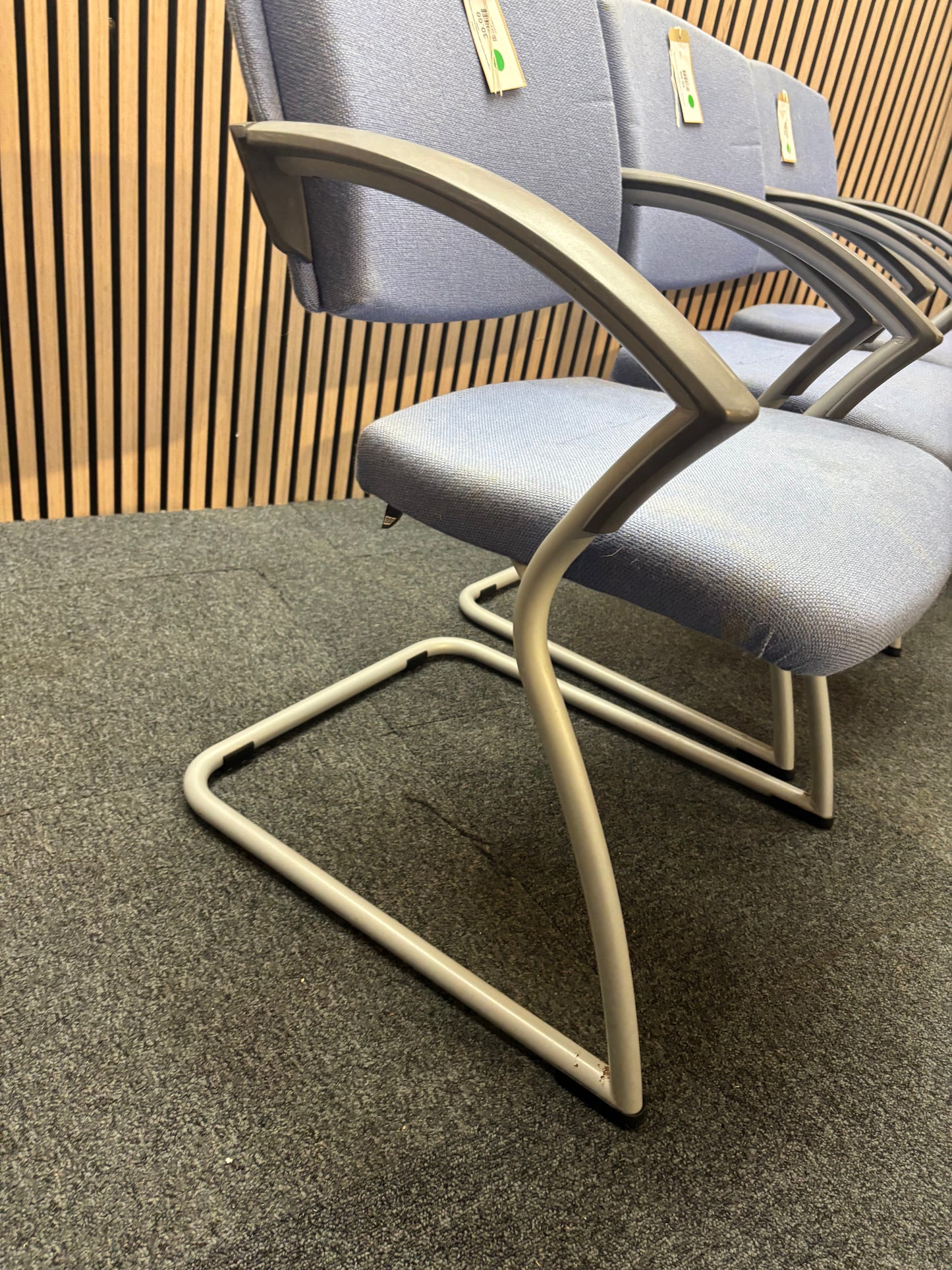 Light blue fabric solid metal framed meeting chair with arms