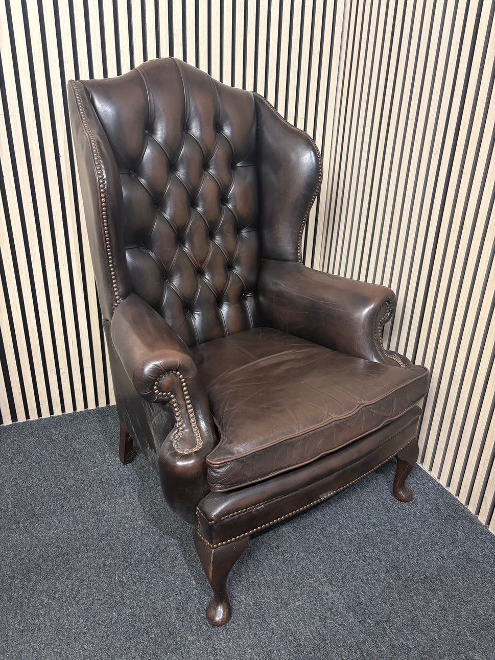 High wing back dark brown leather chesterfield armchair 43508