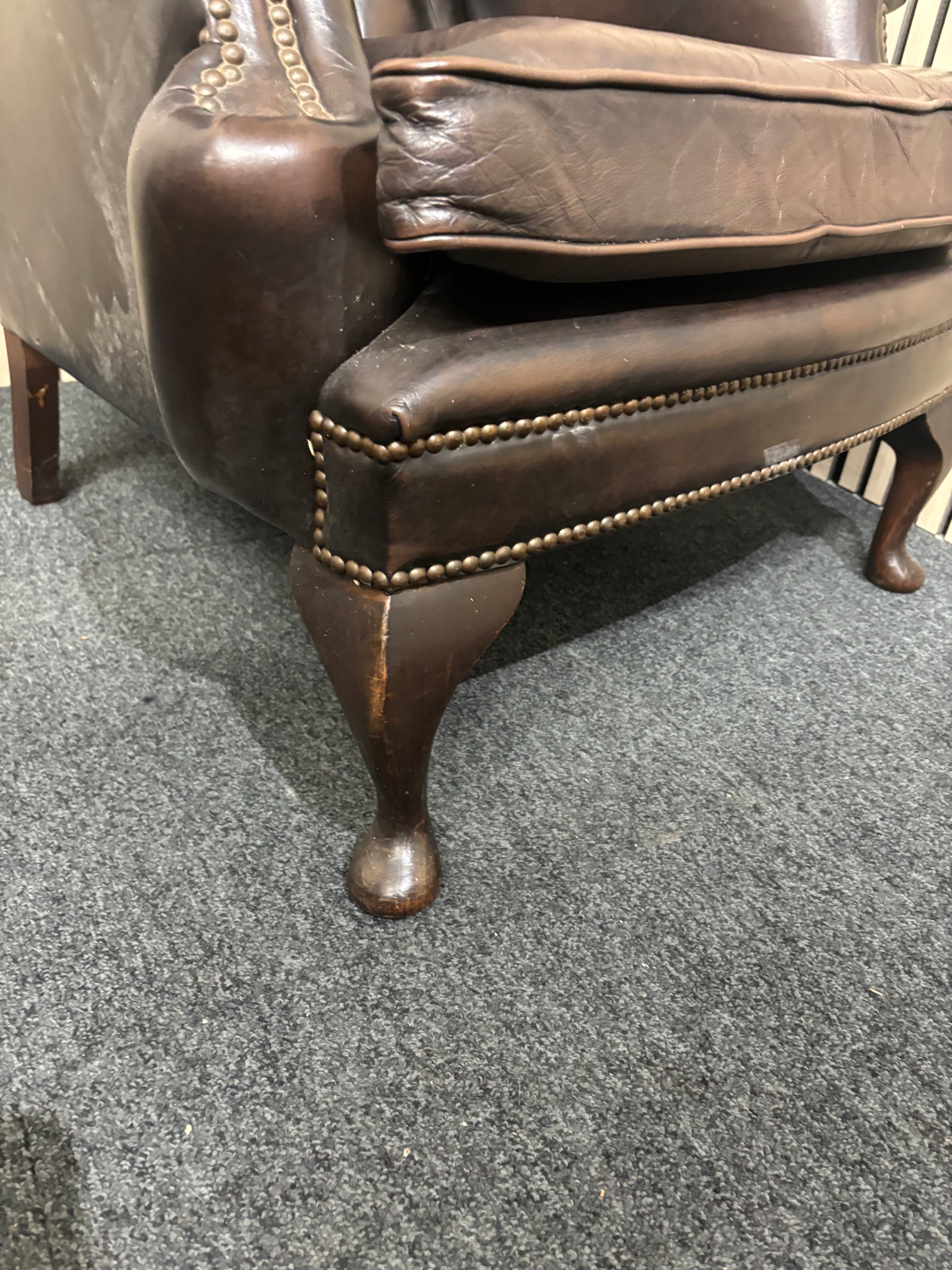 High wing back dark brown leather chesterfield armchair 43508