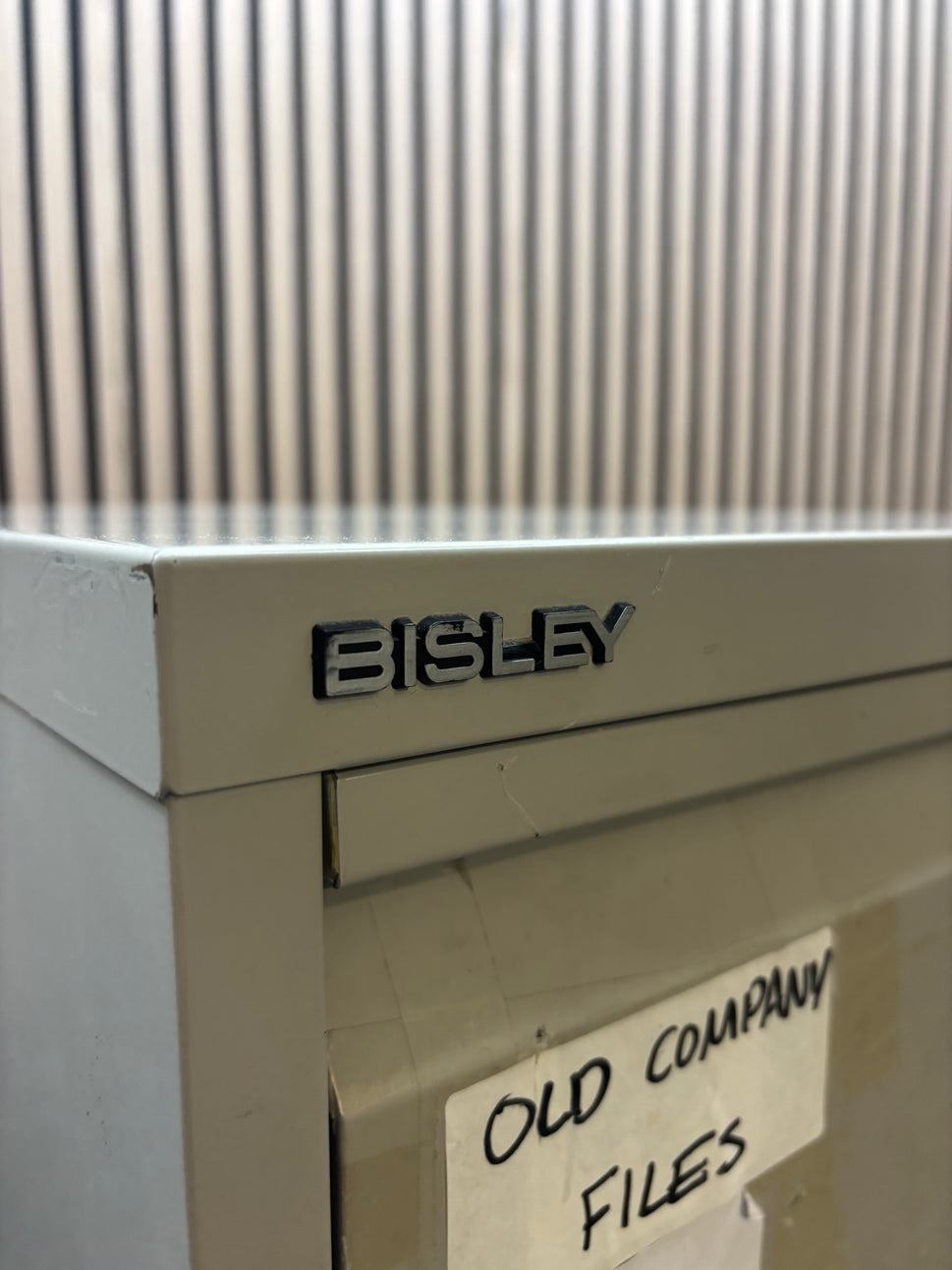 Bisley 4 drawer filing cabinet in grey metal