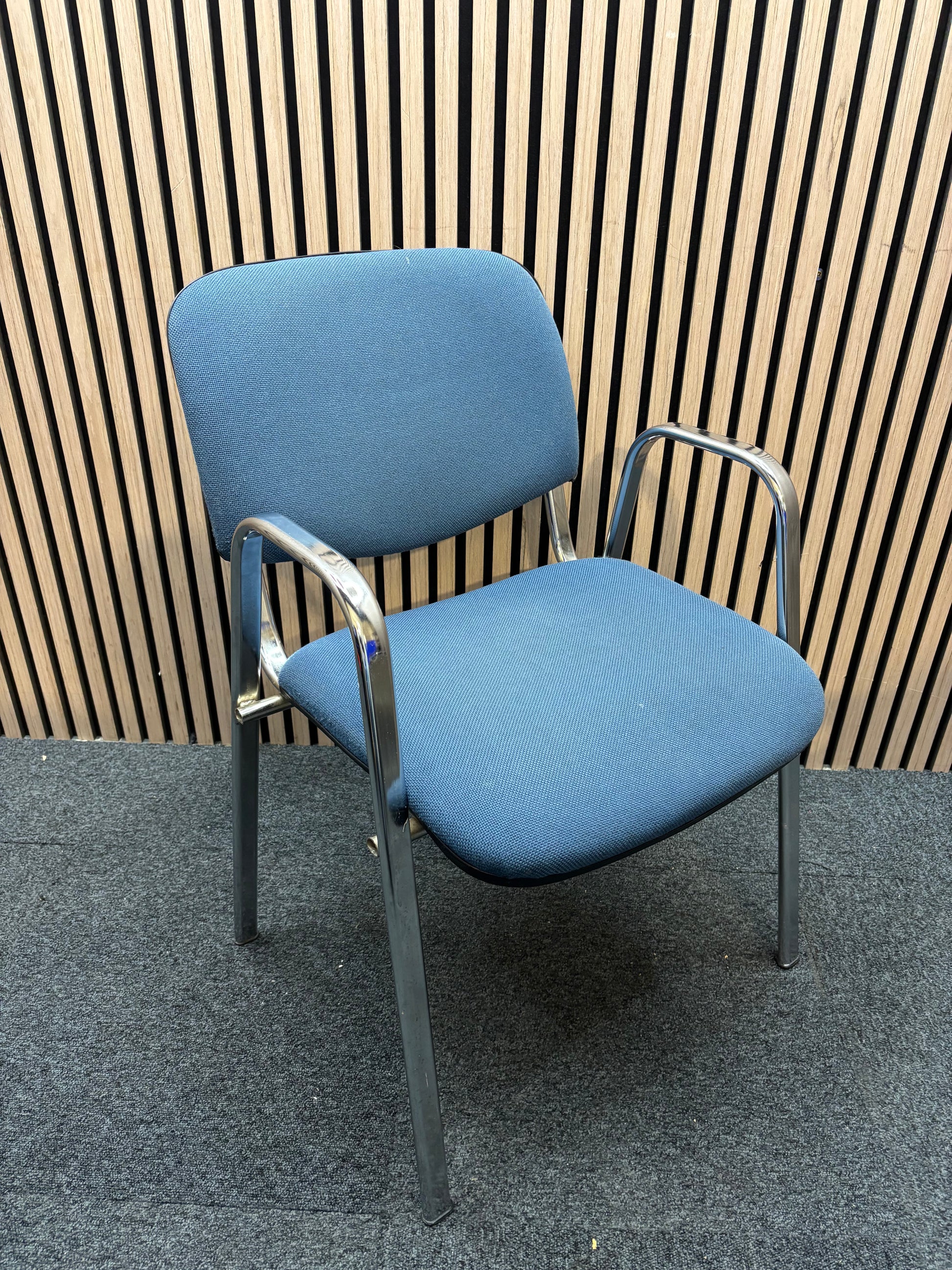 Light blue fabric chrome framed stacking chair