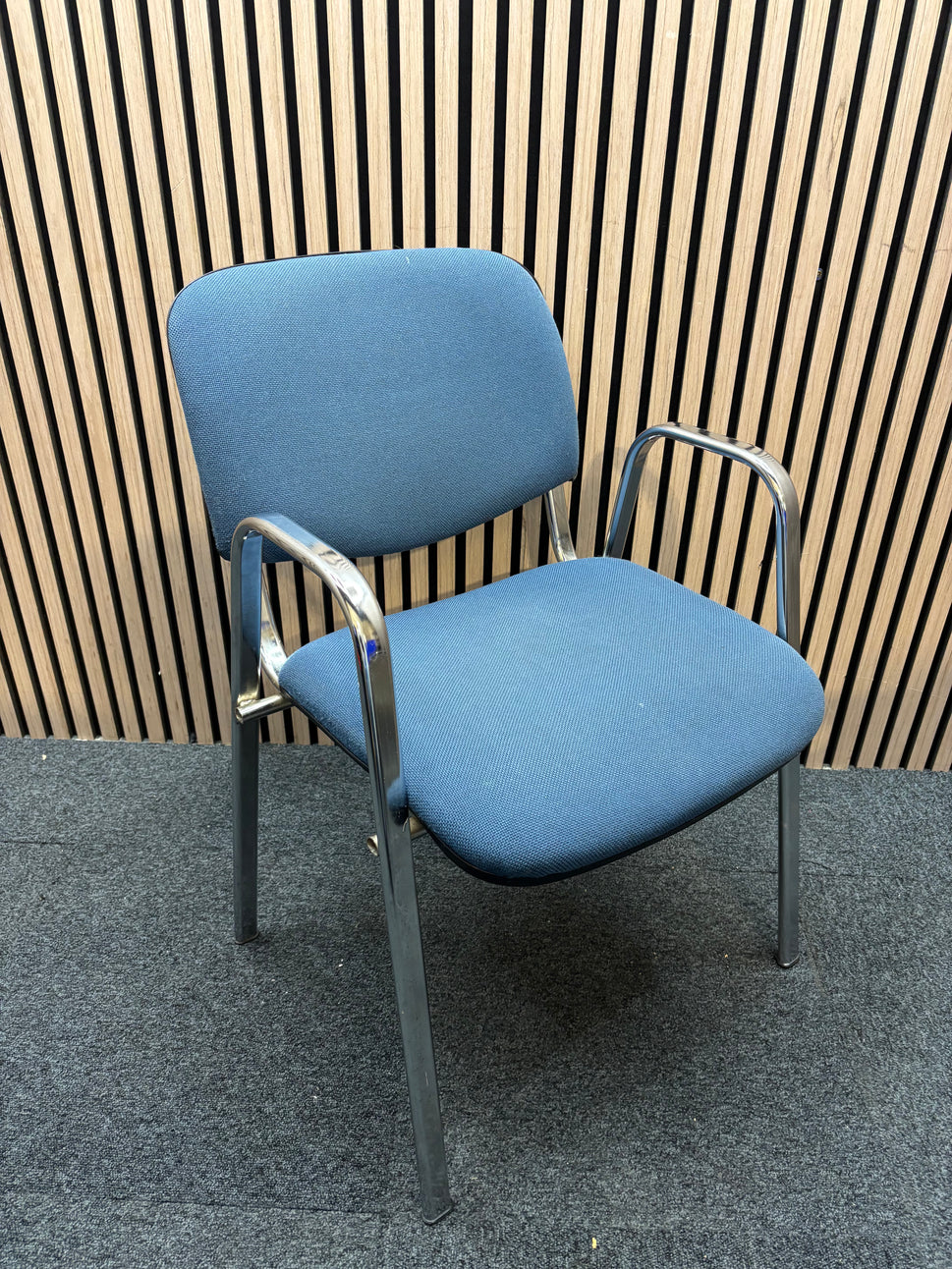 Light blue fabric chrome framed stacking chair