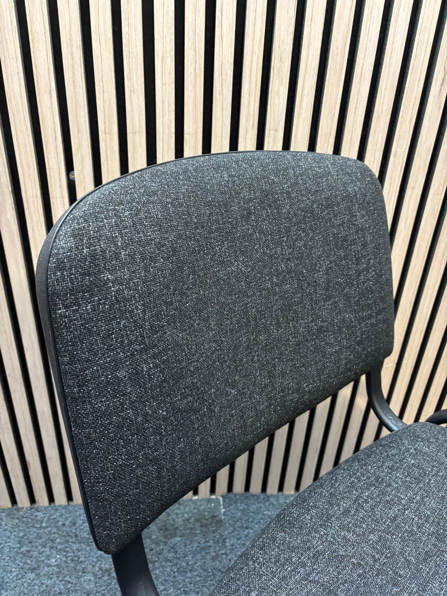 Charcoal fabric black framed stacking chair