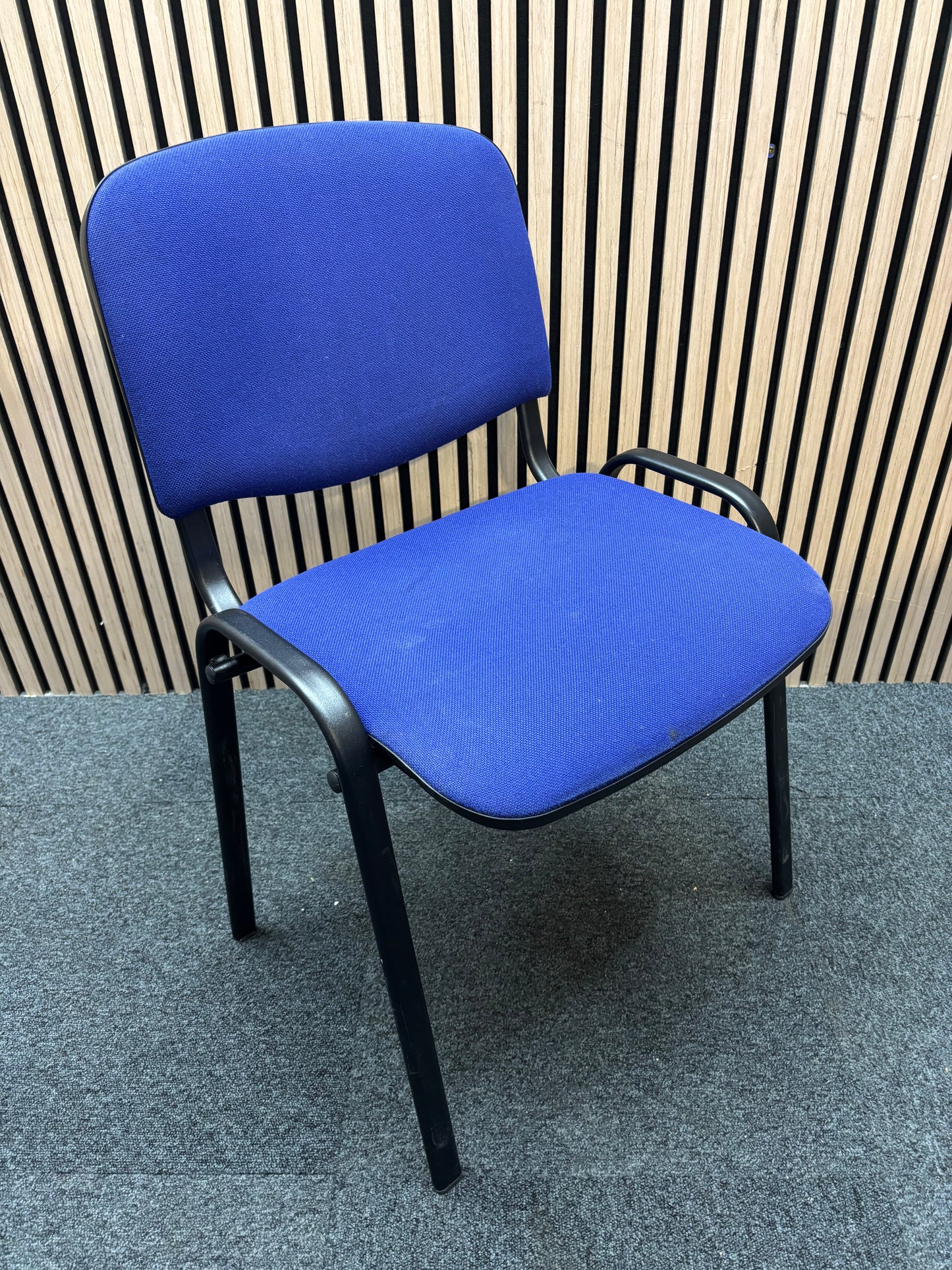 Dark blue fabric black framed stacking chair