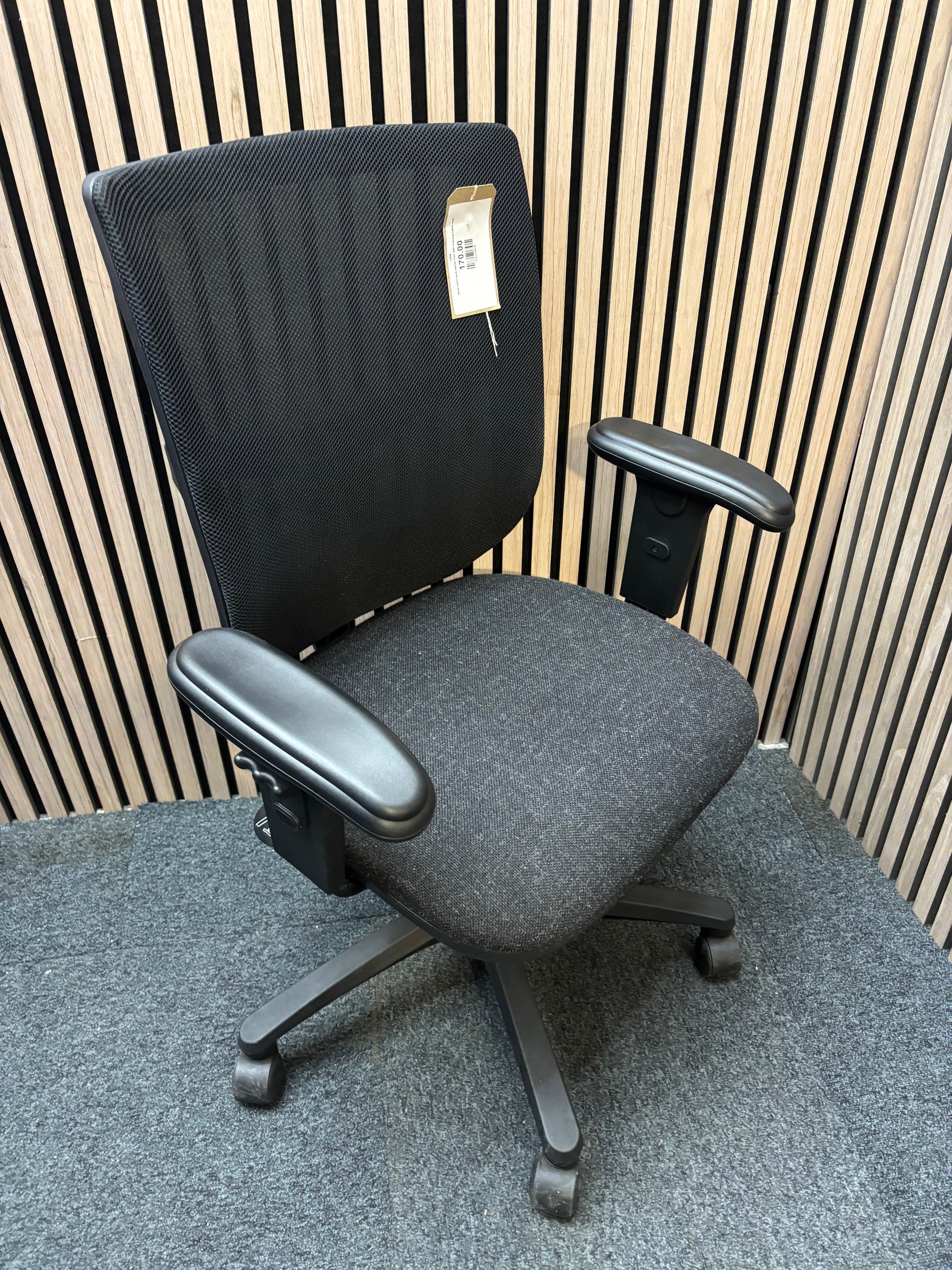 Black mesh back swivel chair with charcoal fabric seat