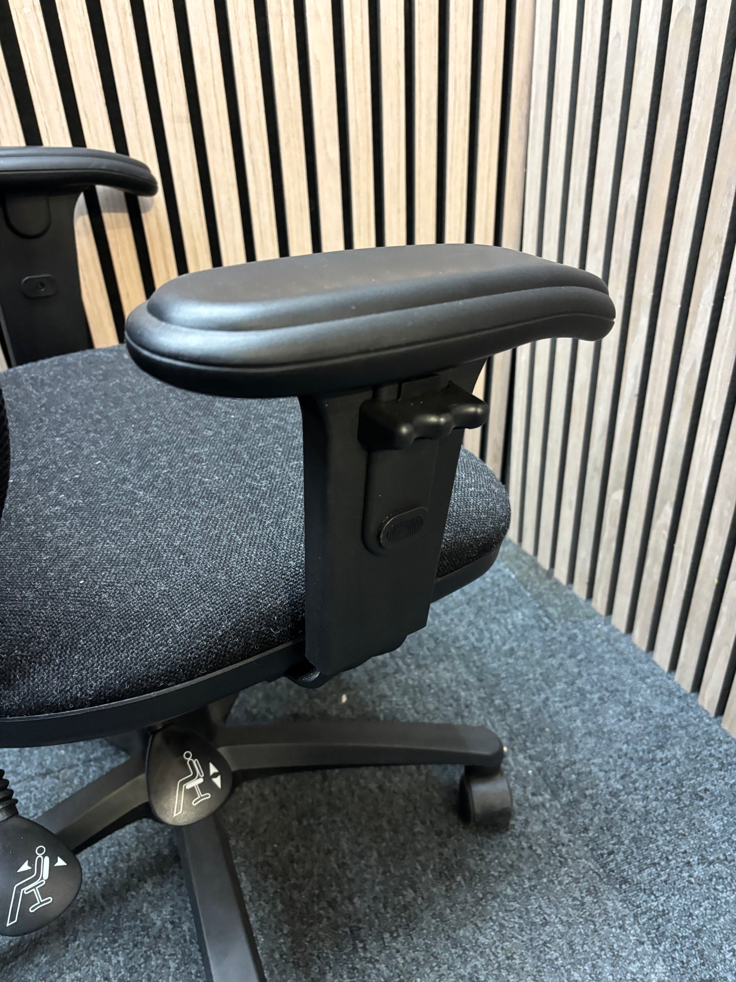 Black mesh back swivel chair with charcoal fabric seat
