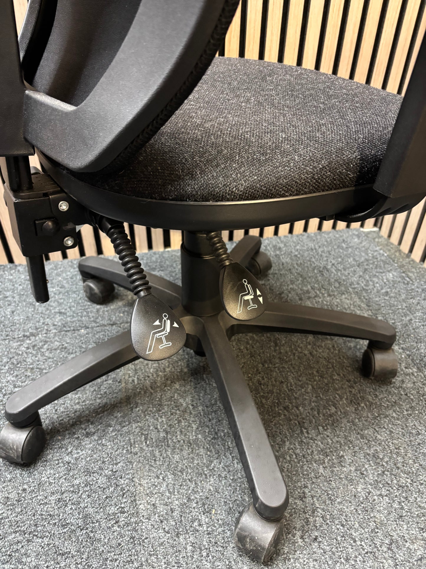 Black mesh back swivel chair with charcoal fabric seat