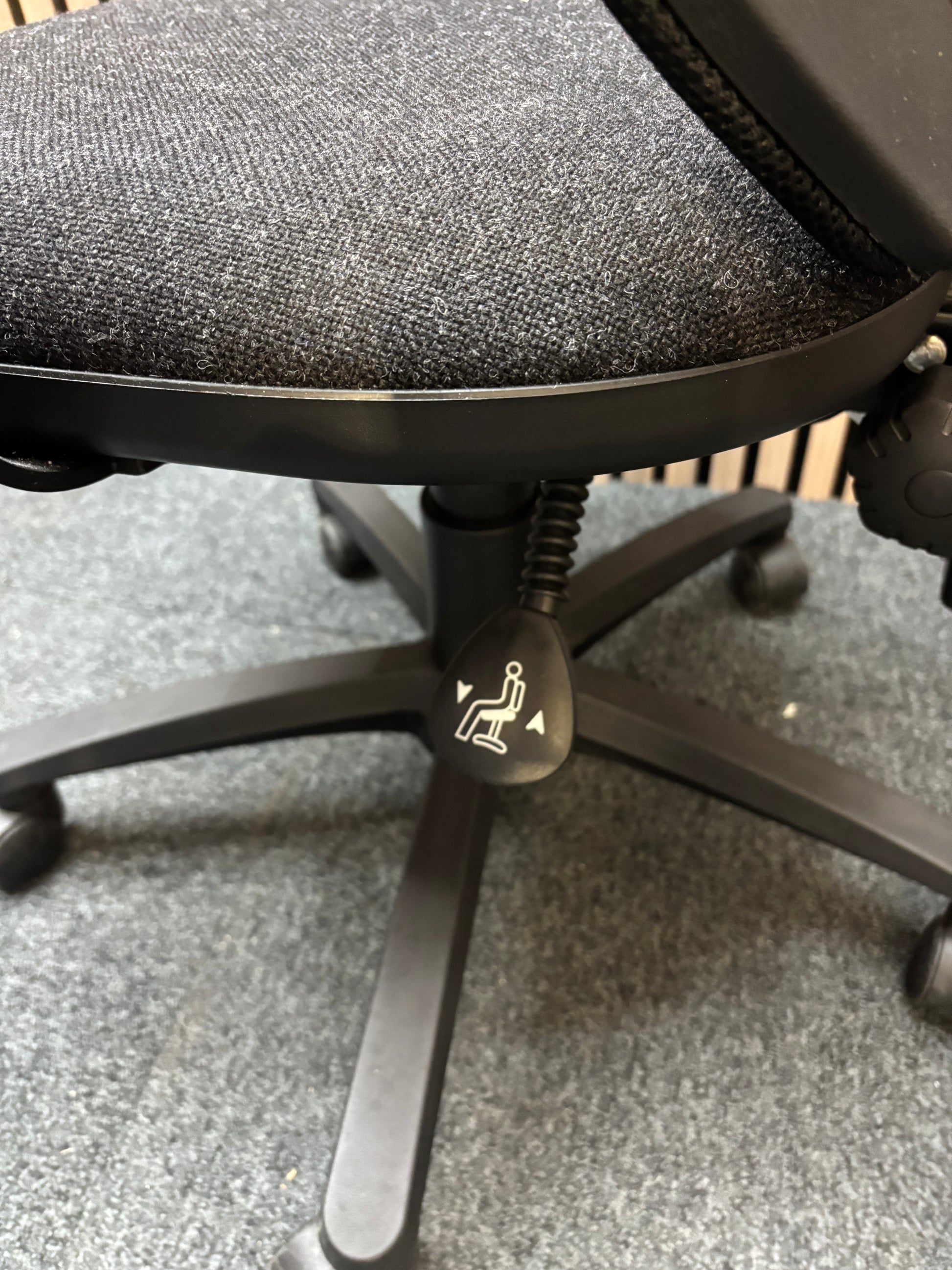 Black mesh back swivel chair with charcoal fabric seat