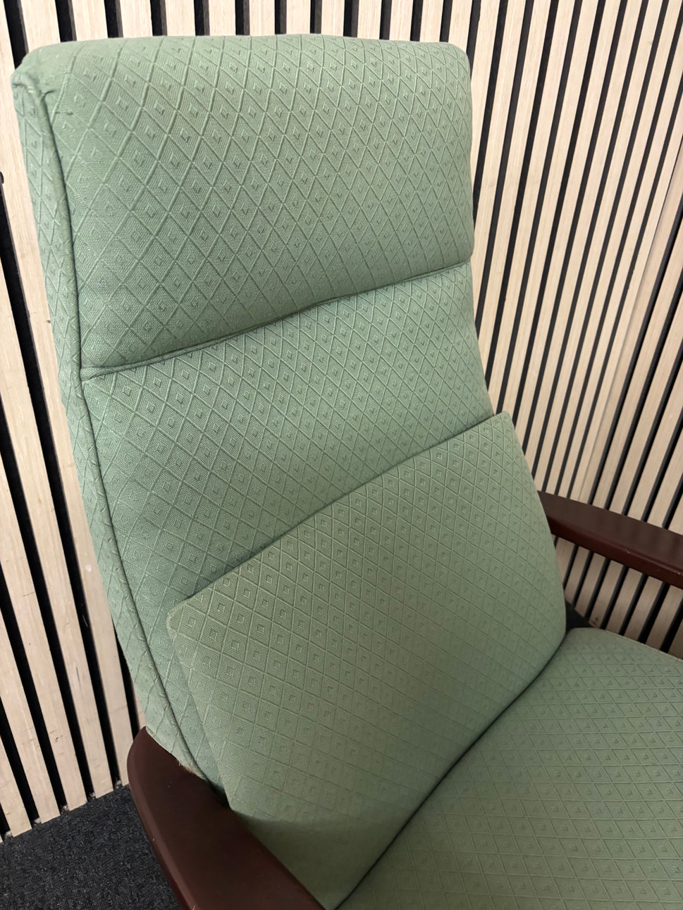 High back solid wood framed green fabric fireside armchair 43652
