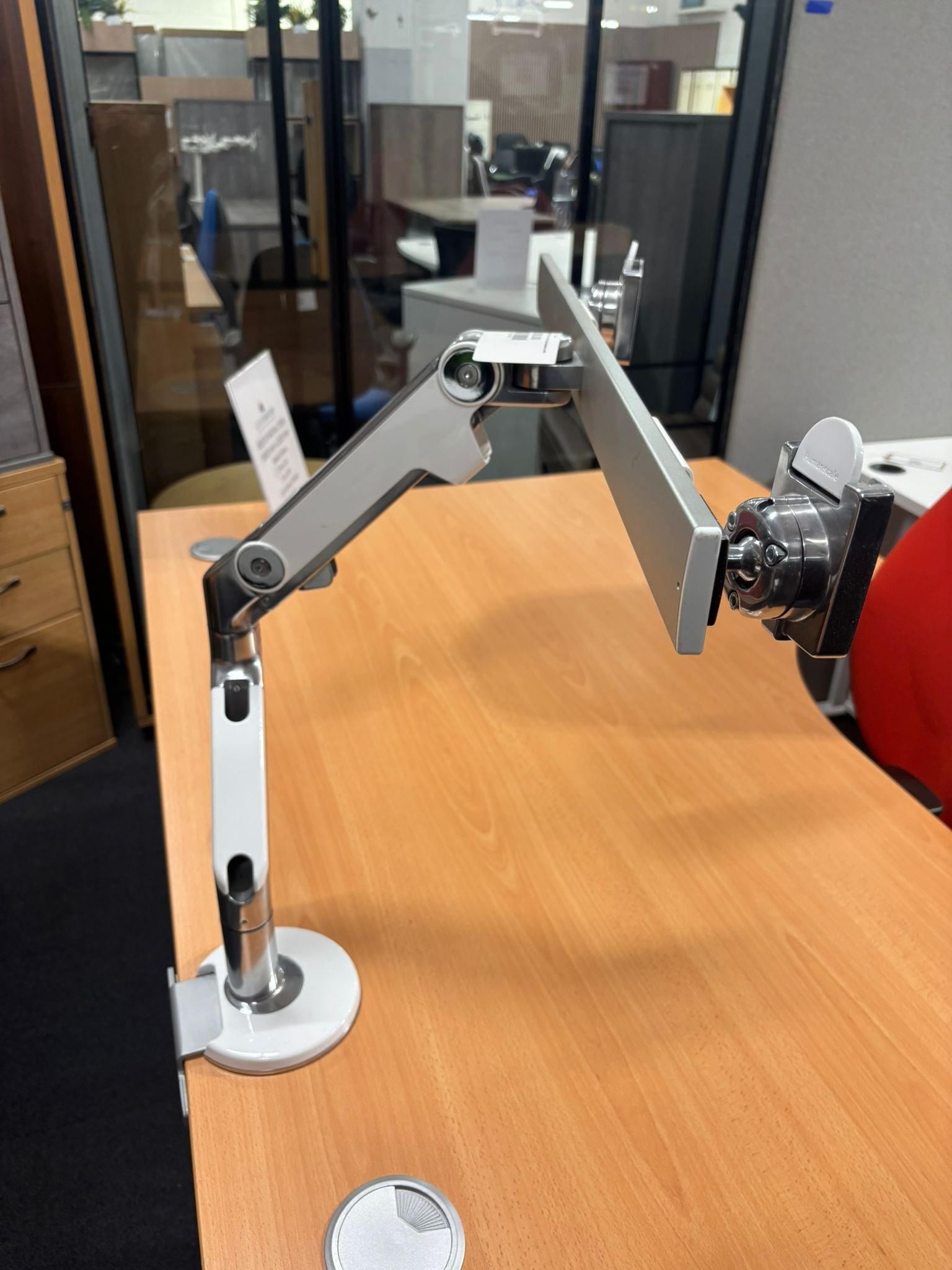 Desk mounted double monitor arm human scale chrome and metal finish