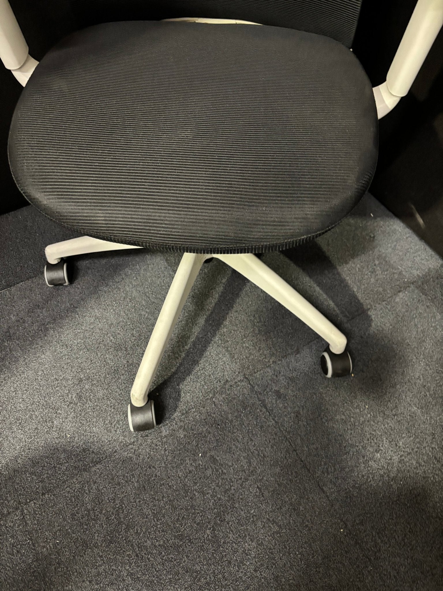 Sway black mesh back adjustable operator chair with black fabric seat, grey frame and base