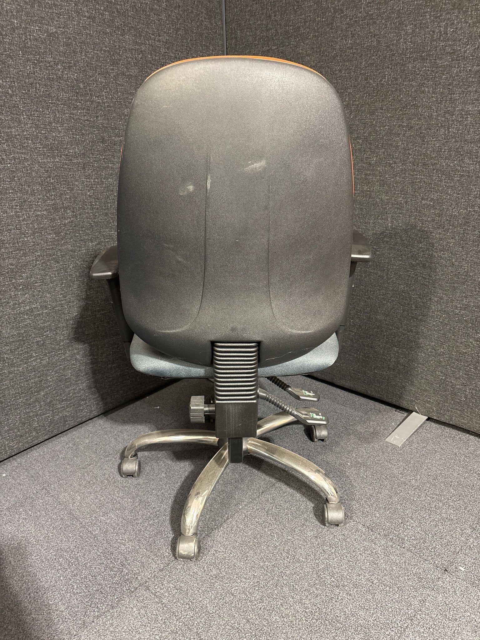 Two tone orange and grey high back swivel chair with height adjustable arms
