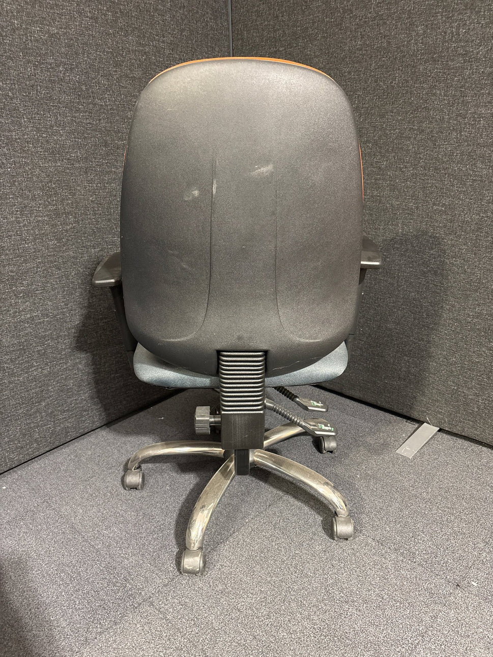 Two tone orange and grey high back swivel chair with height adjustable arms