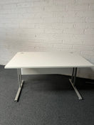 SECONDHAND 1200Lx800Dx720H White cantilever desk with silver metal frame and white modestly panel. IN EXCELLENT CONDITION. Price inclusive of VAT