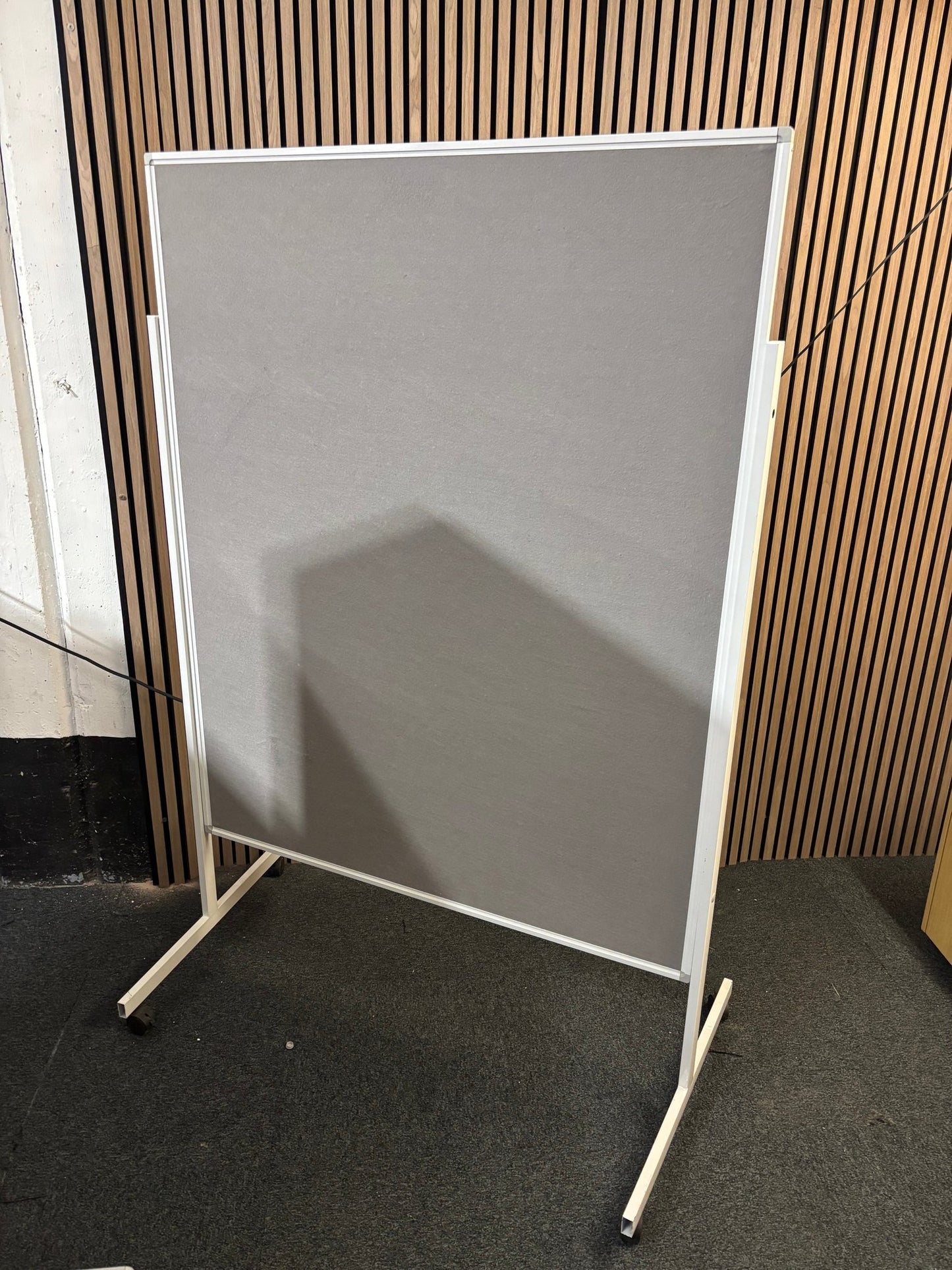 Grey fabric 1850 x 1250mm floor standing noticeboard on castors