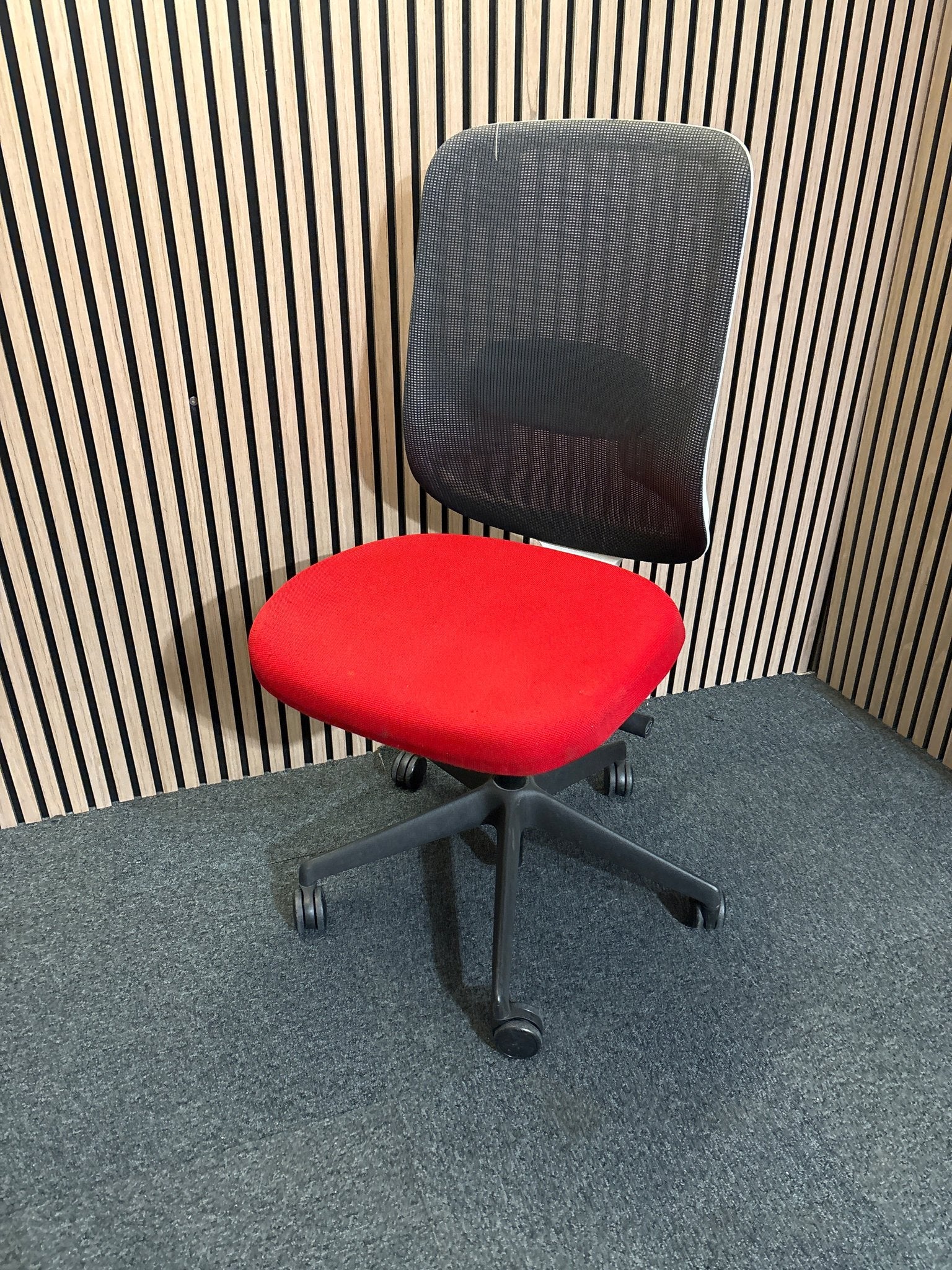 Orangebox mesh back, dark grey seat fabric swivel chair, metal 5 star base on castors. Add Add arms for €40.00  1425