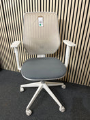 Switch Orangebox mesh back, dark blue seat fabric swivel chair, metal 5 star base on castors. Add Add arms for €40.00 1425 2 image