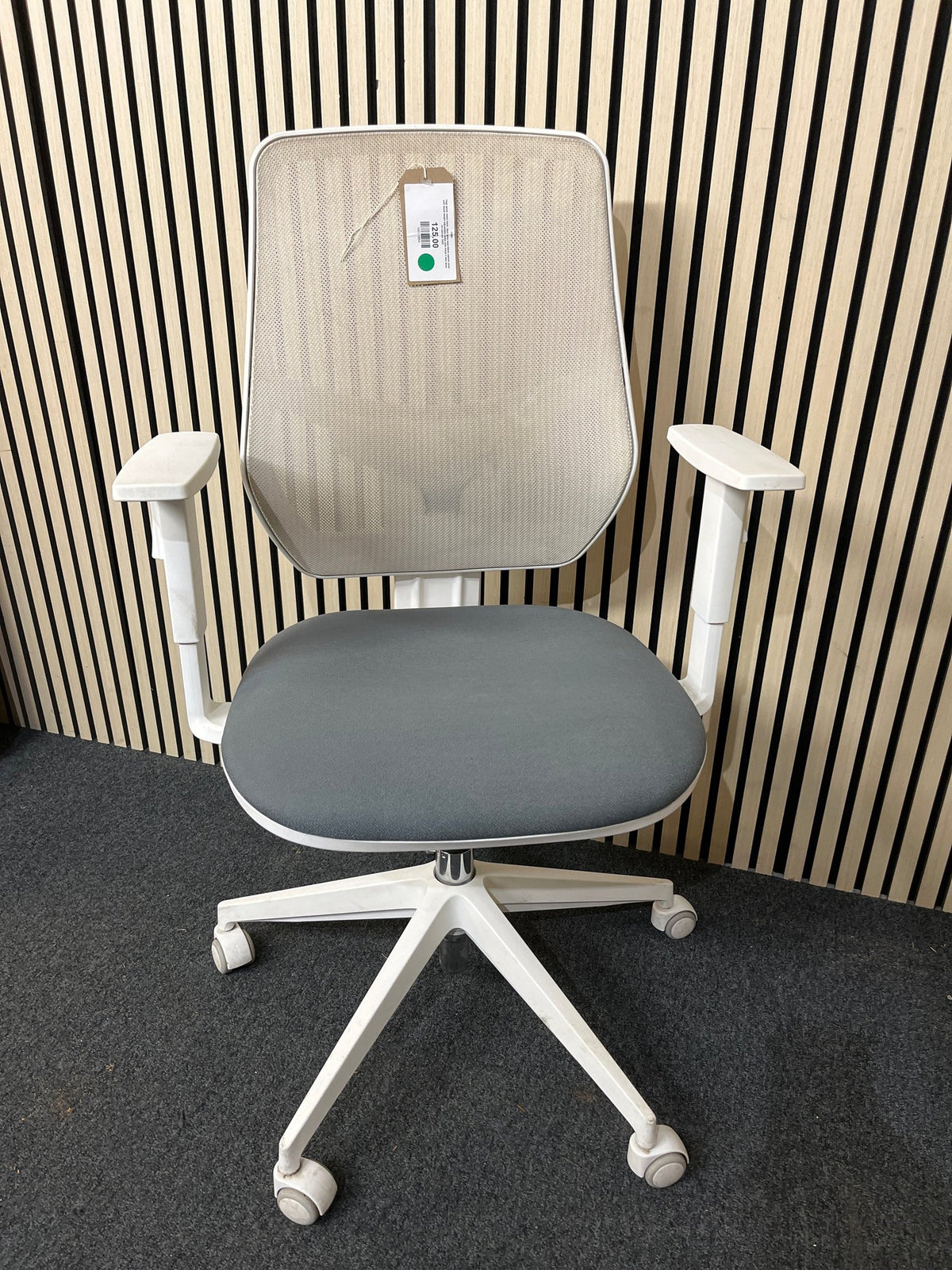 Orangebox mesh back, dark blue seat fabric swivel chair, metal 5 star base on castors. Add Add arms for €40.00 1425