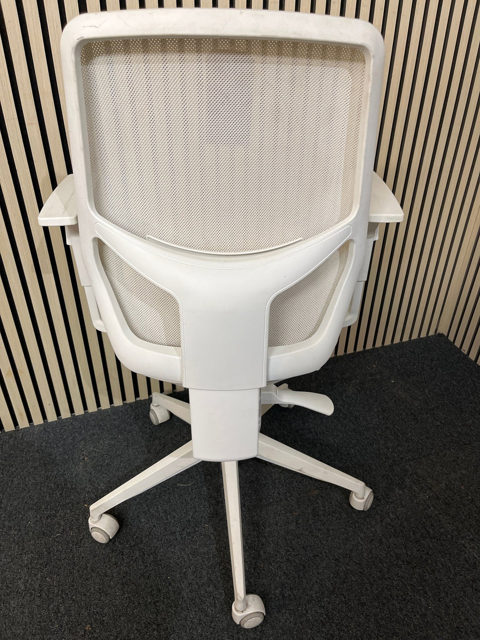 Orangebox mesh back, dark blue seat fabric swivel chair, metal 5 star base on castors. Add Add arms for €40.00 1425