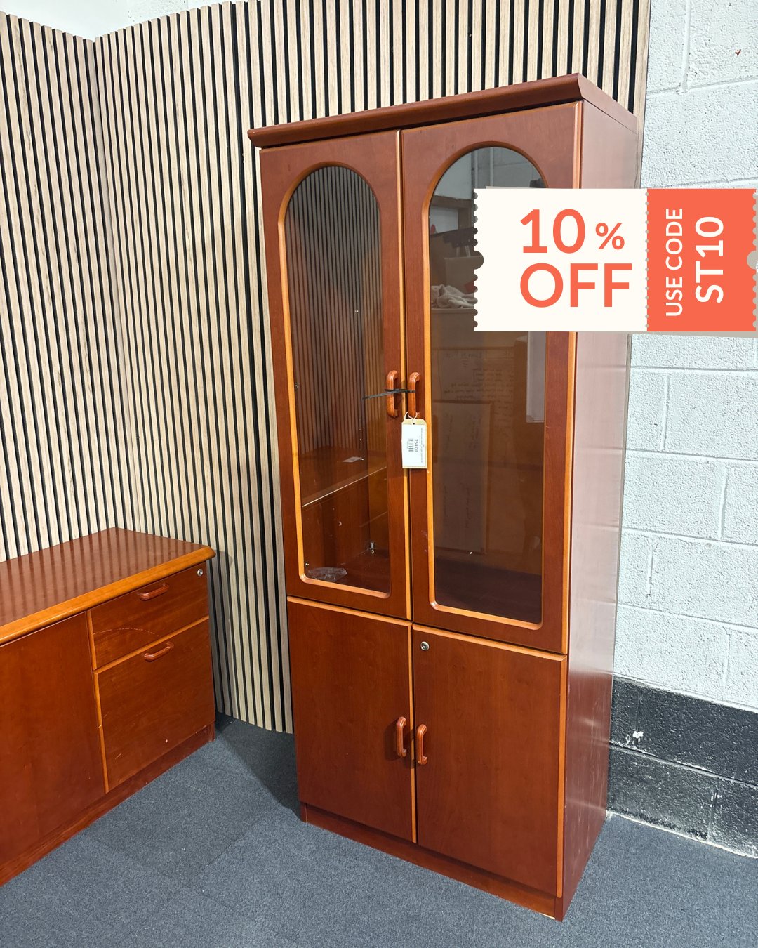 Tall dark mahogany stained 4 door glass display unit with base storage 1950Hx800Wx500D