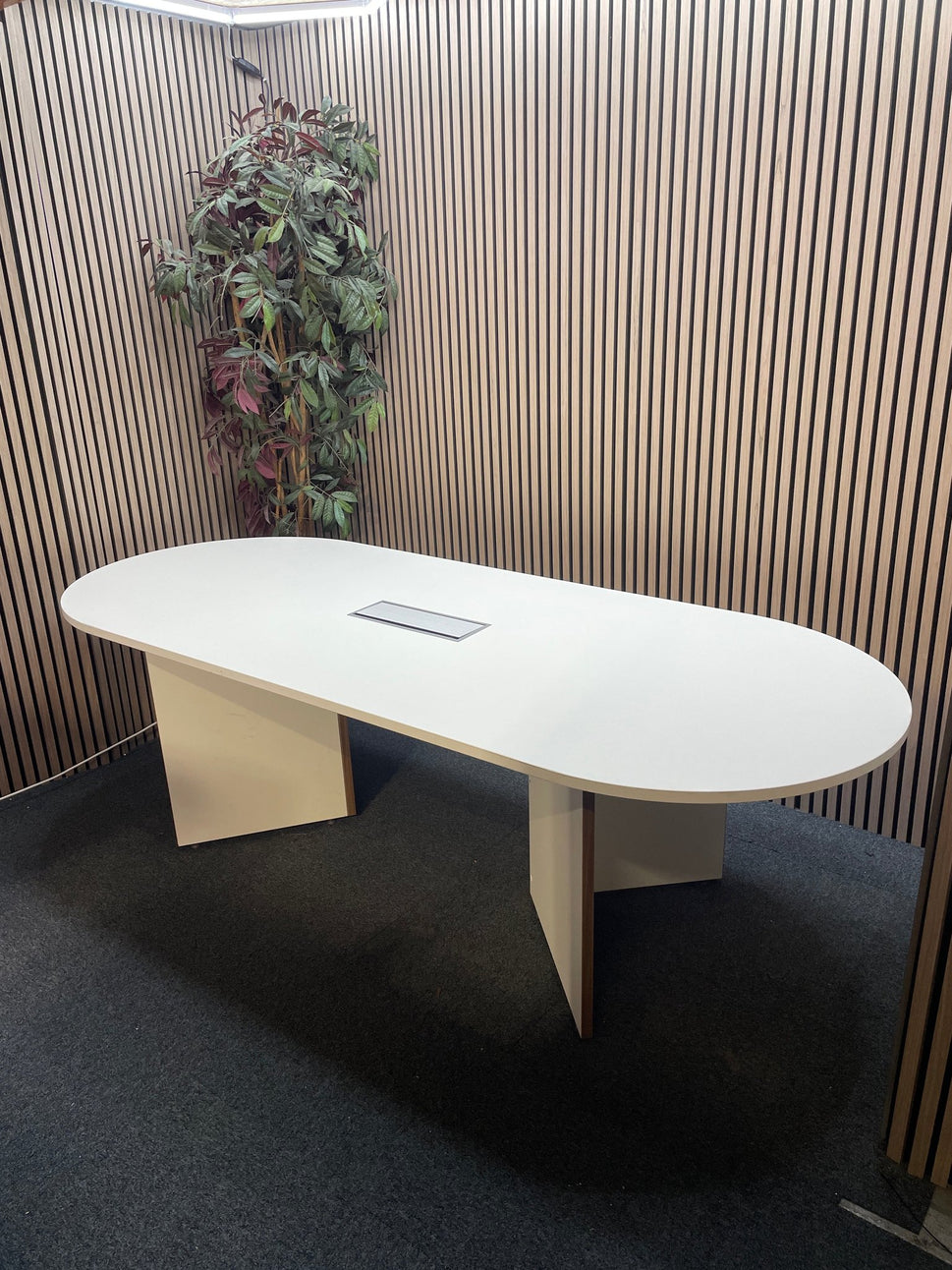 White laminate D end boardroom table 2400Lx1000W with silver trumpet base and wire management lift up cover in centre