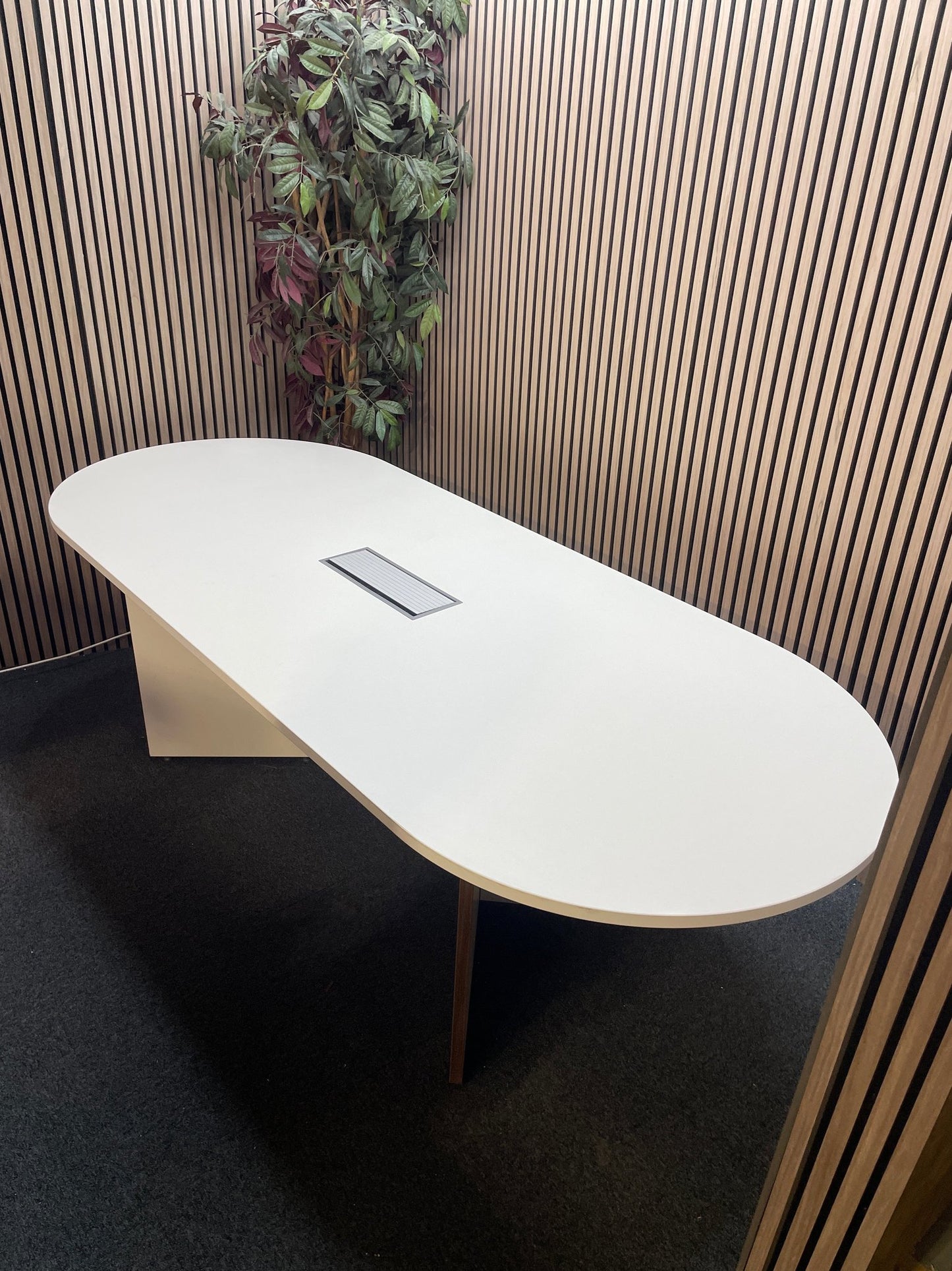 White laminate D end boardroom table 2400Lx1000W with silver trumpet base and wire management lift up cover in centre