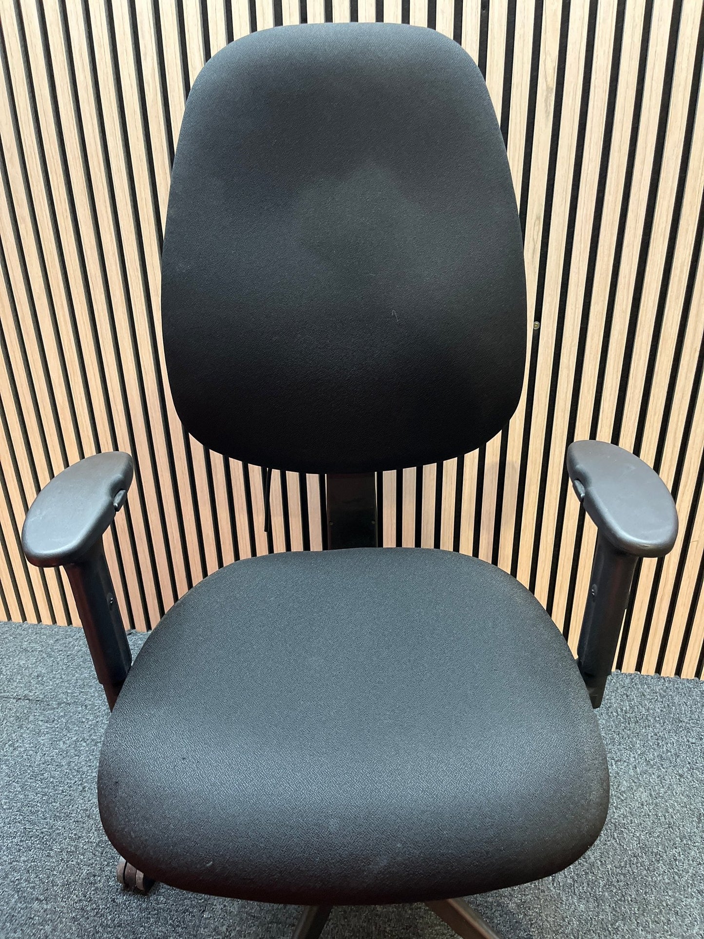 Black fabric ortho swivel
 chair with adjustable arms and pump up lumbar support