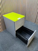 Grey metal mobile pedestal with lime green top