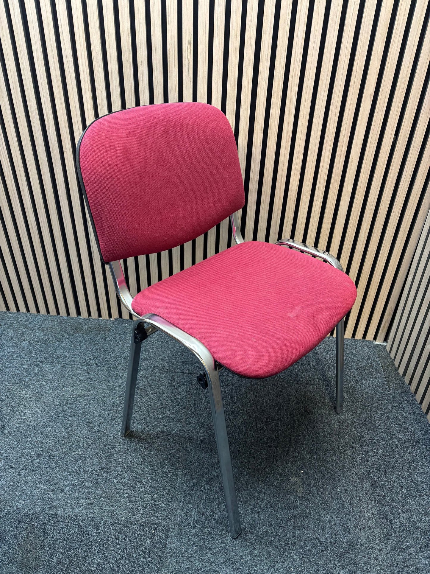 Red fabric solid metal framed stacking chair