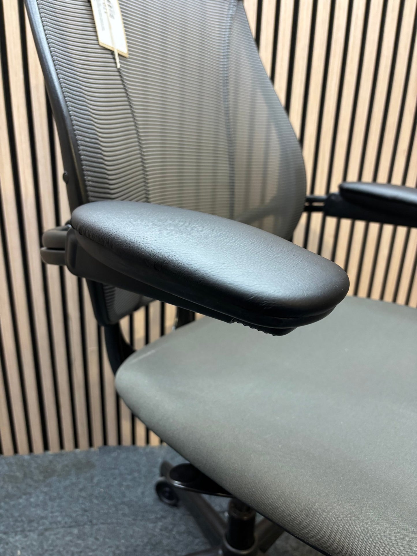 Humanscale Liberty secondhand mesh back swivel chair with fabric seat and adjsutable arms, metal polished 5 star base