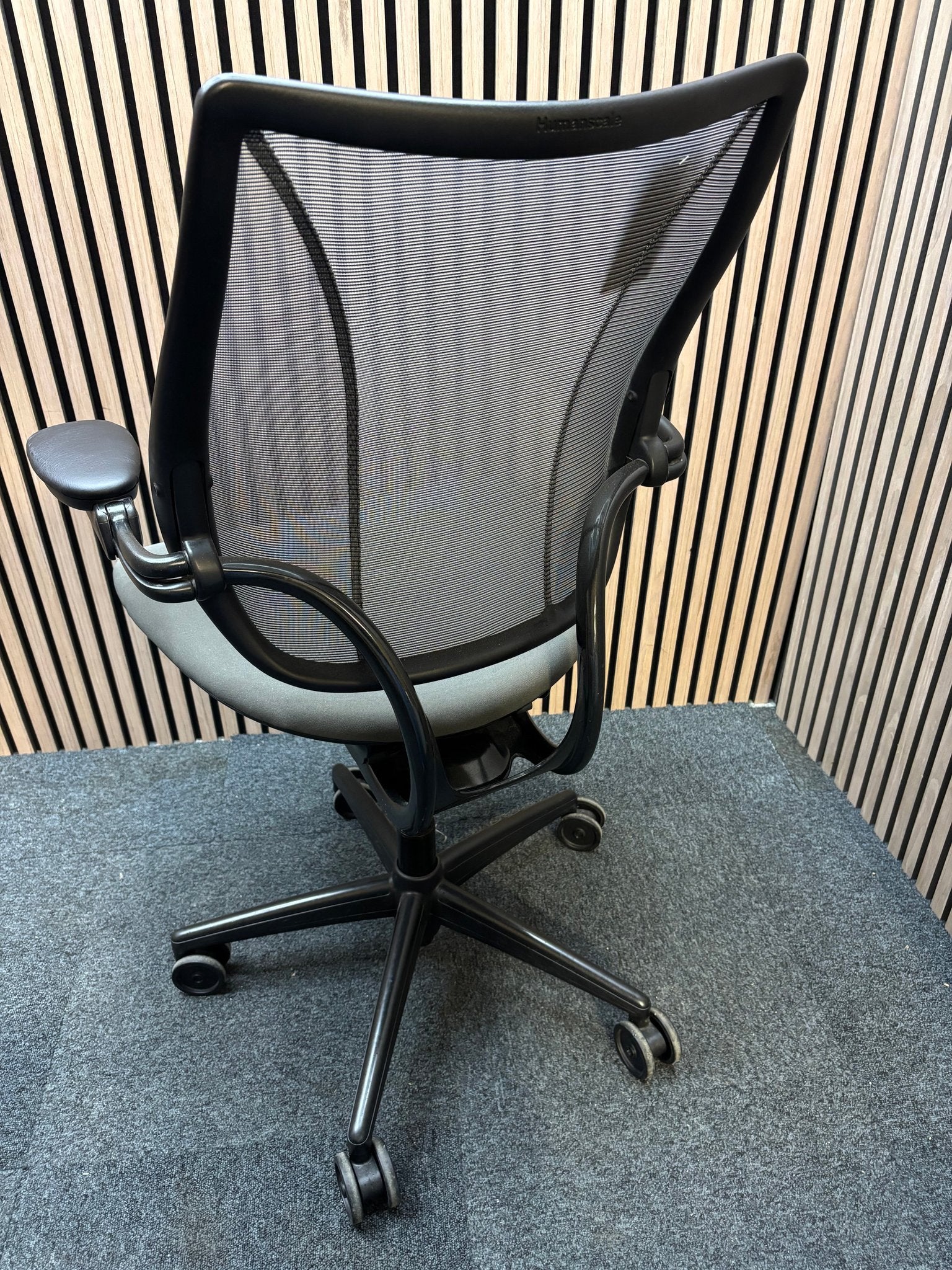 Humanscale Liberty secondhand mesh back swivel chair with fabric seat and adjsutable arms, metal polished 5 star base